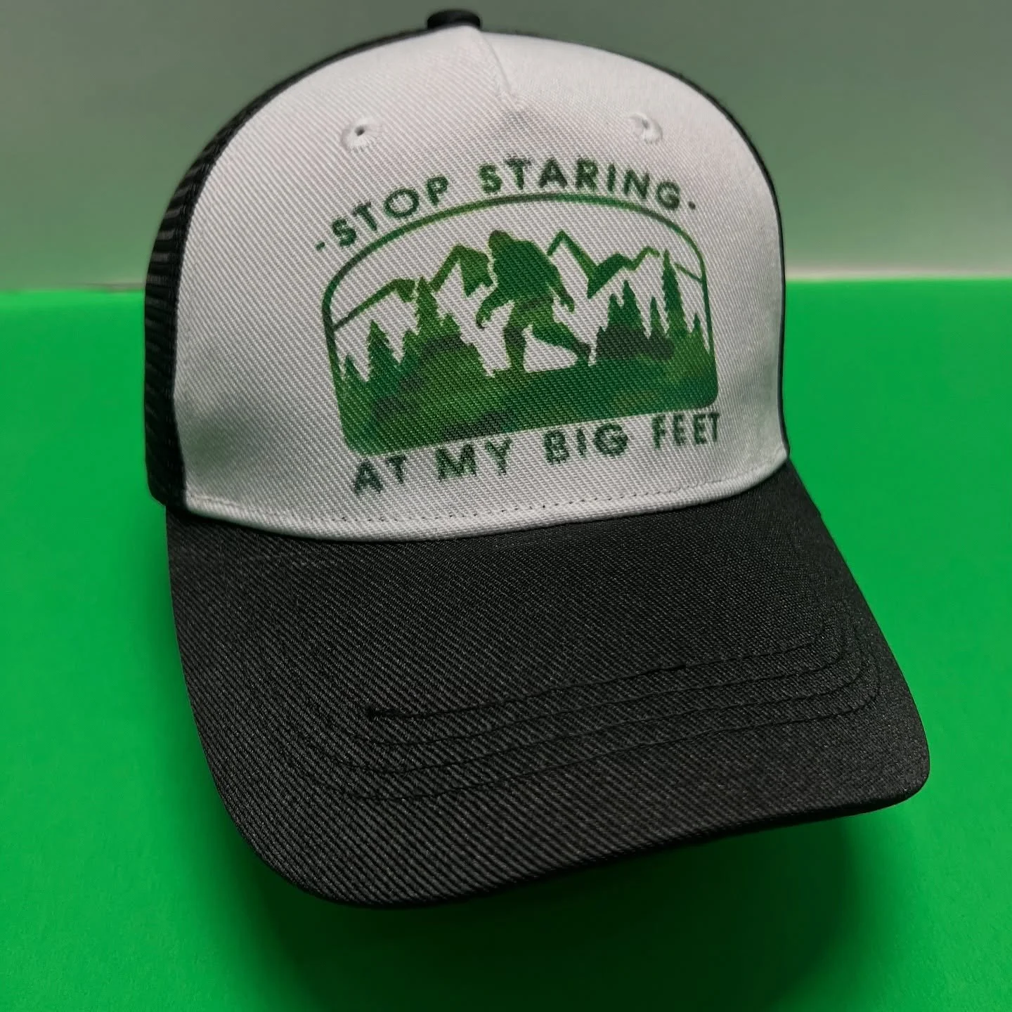 This Bigfoot Trucker cap is great for the outdoor enthusiast or that friend with really big feet. Its size adjustable and the design is done with sublimation ink so it will not come off with wear like traditional iron on patches.&nbsp; Link to produc