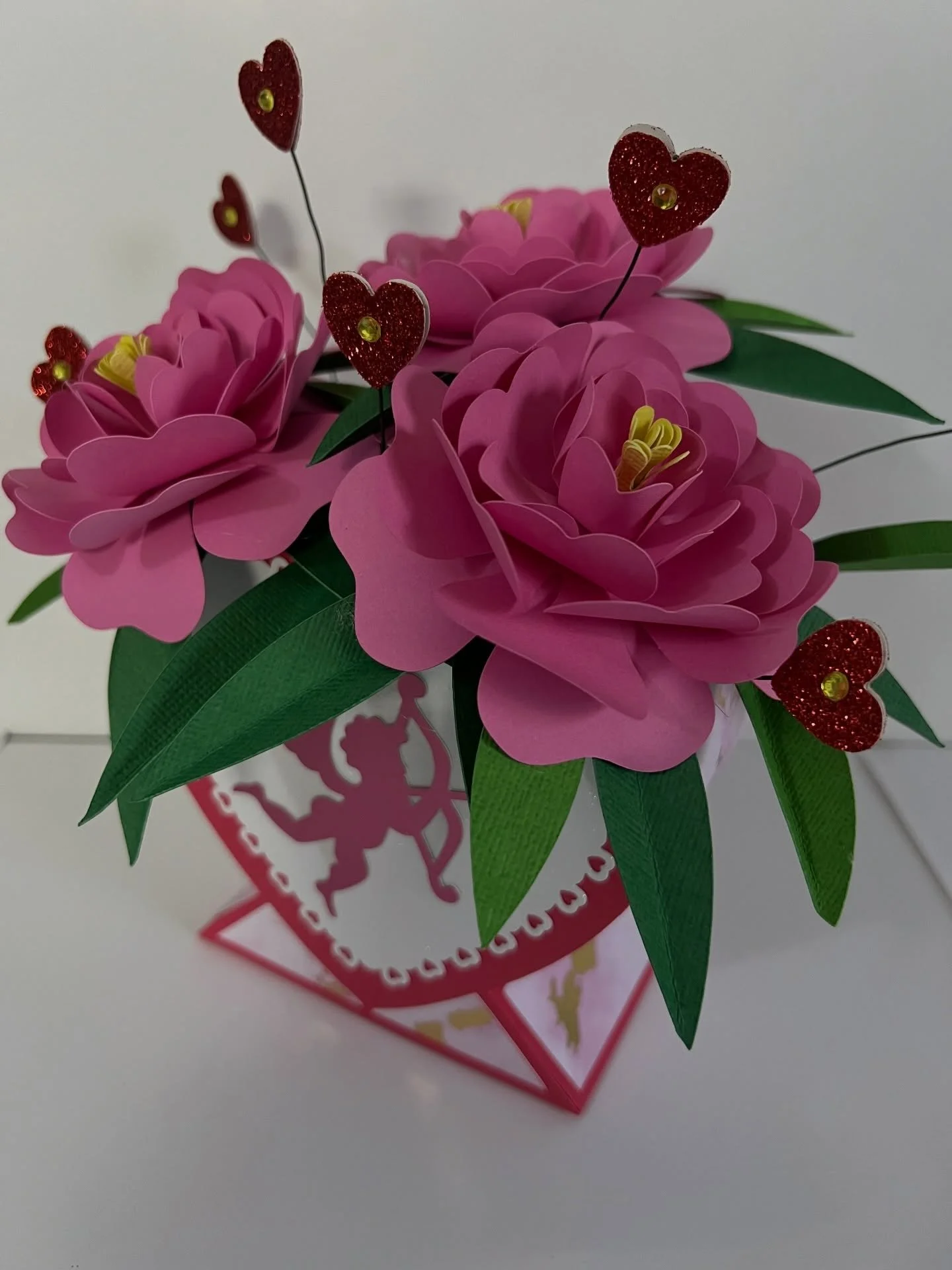 Happy Valentine&rsquo;s Day. I hope your day is filled with love and laughter. #valentinesday #valentinesdayflowers #paperflowers #cupid #paperboquet
