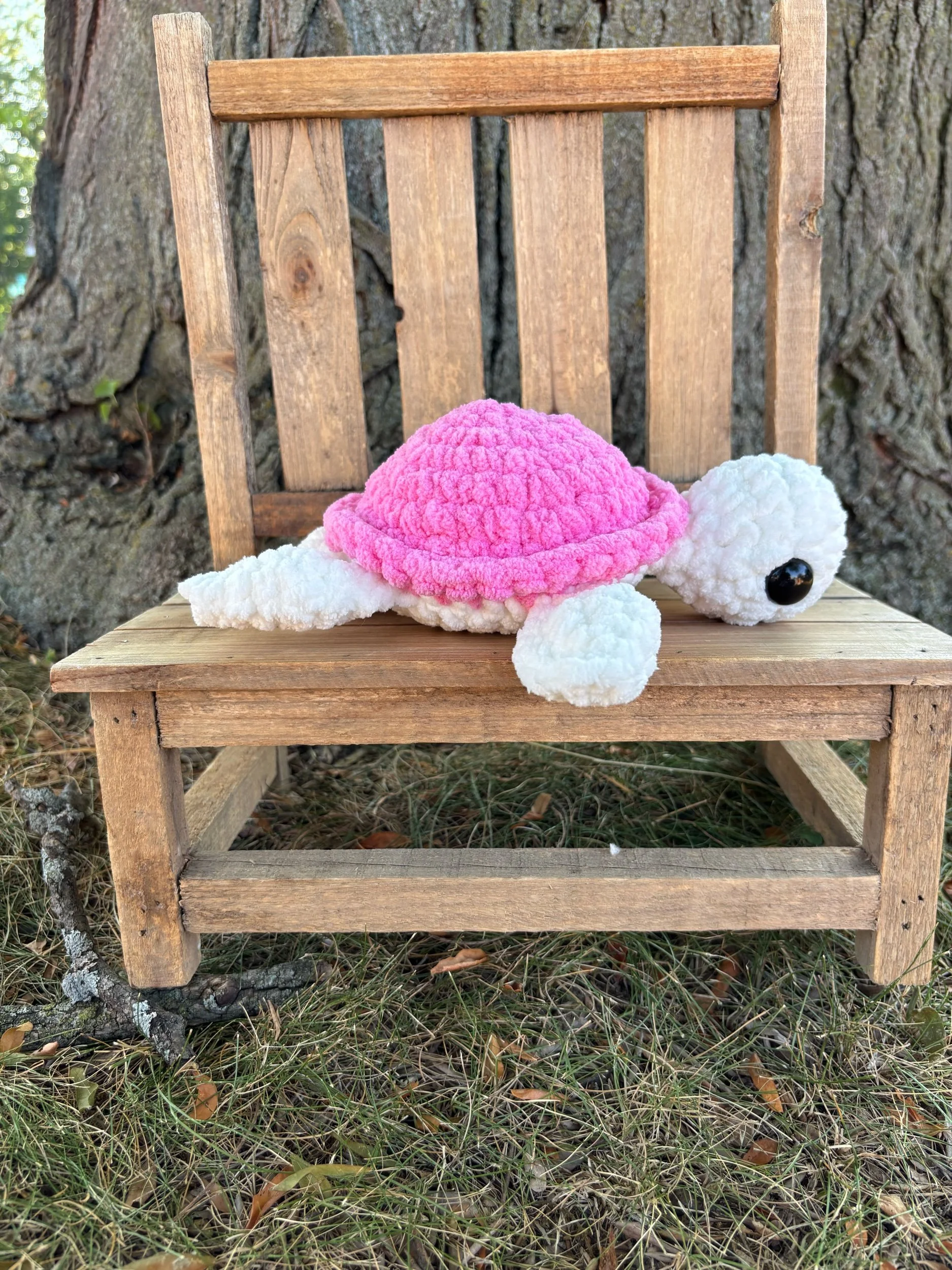 Handmade crochet turtle plushie with pink shell