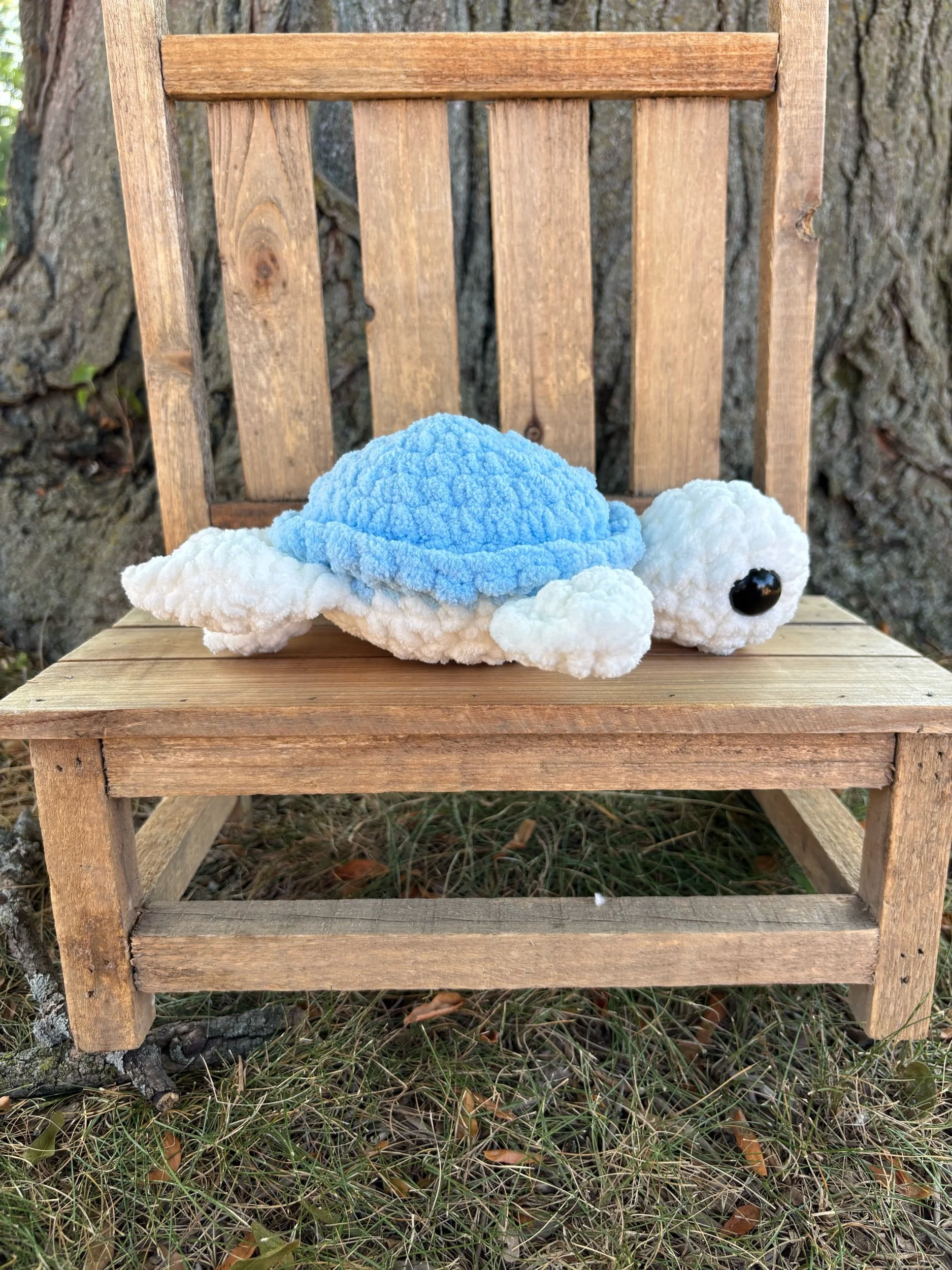 Handmade crochet turtle plushie with blue shell