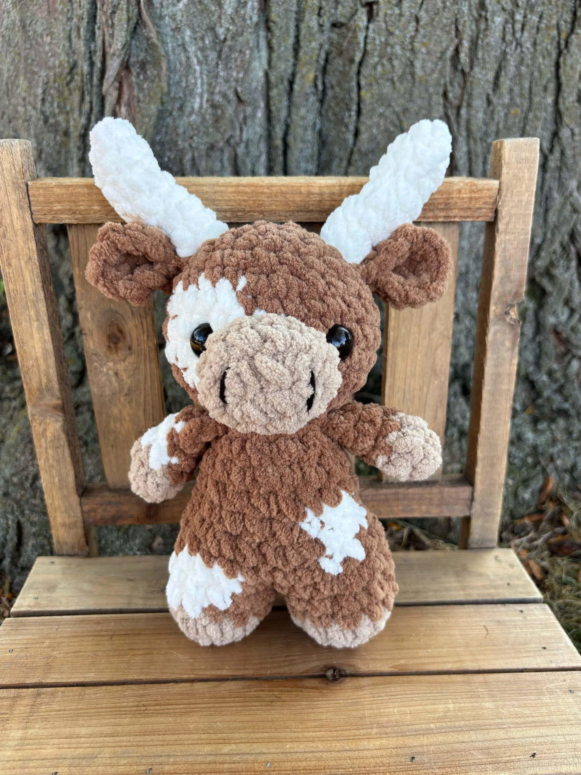 Handmade crochet baby longhorn plushie
