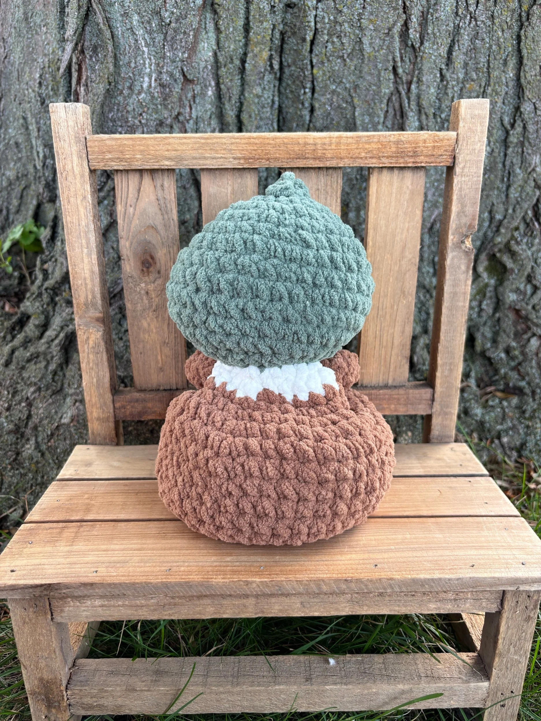 Back of crochet weighted mallard duck plushie