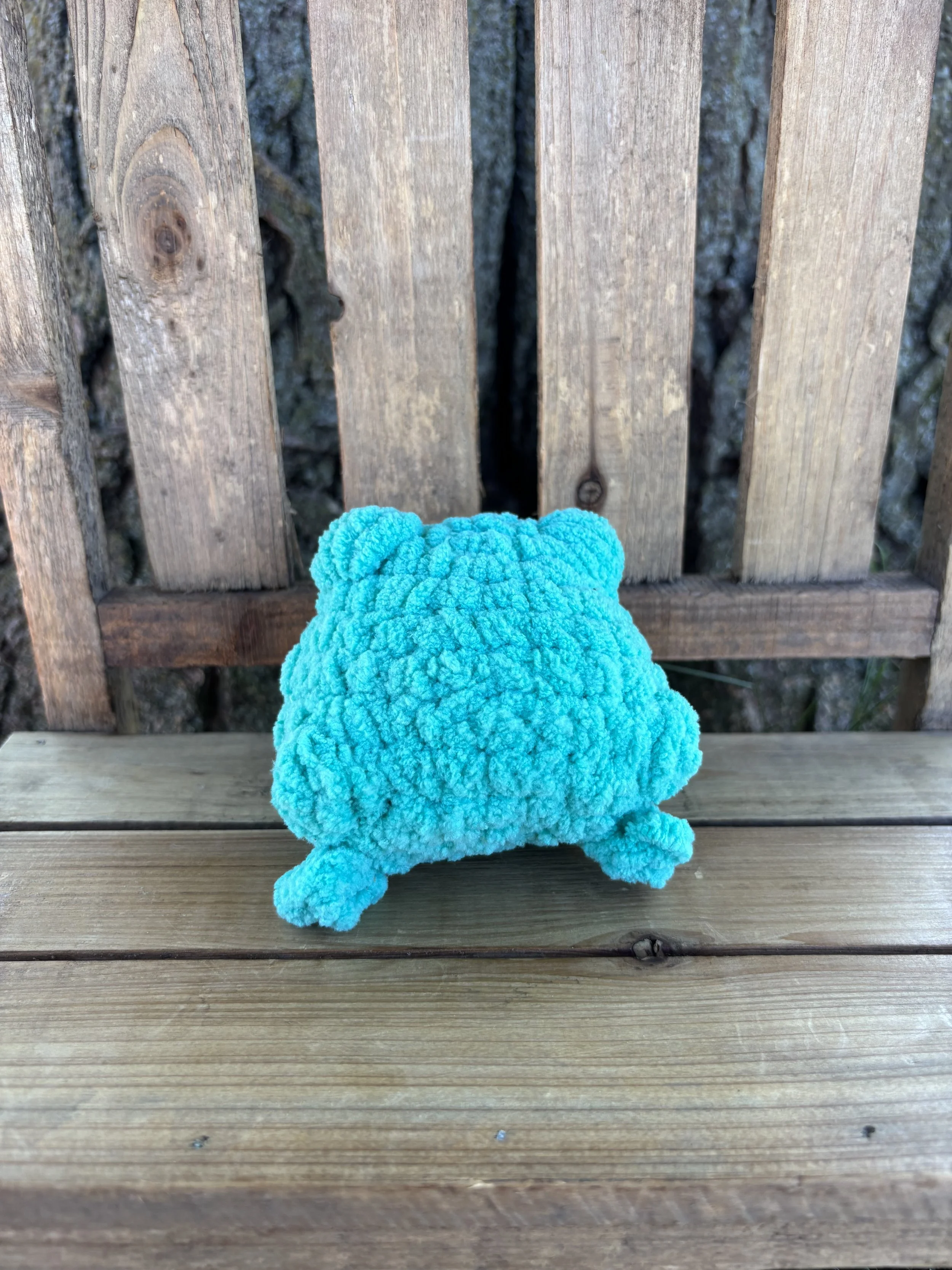 Handmade crochet teal jumping frog plushie