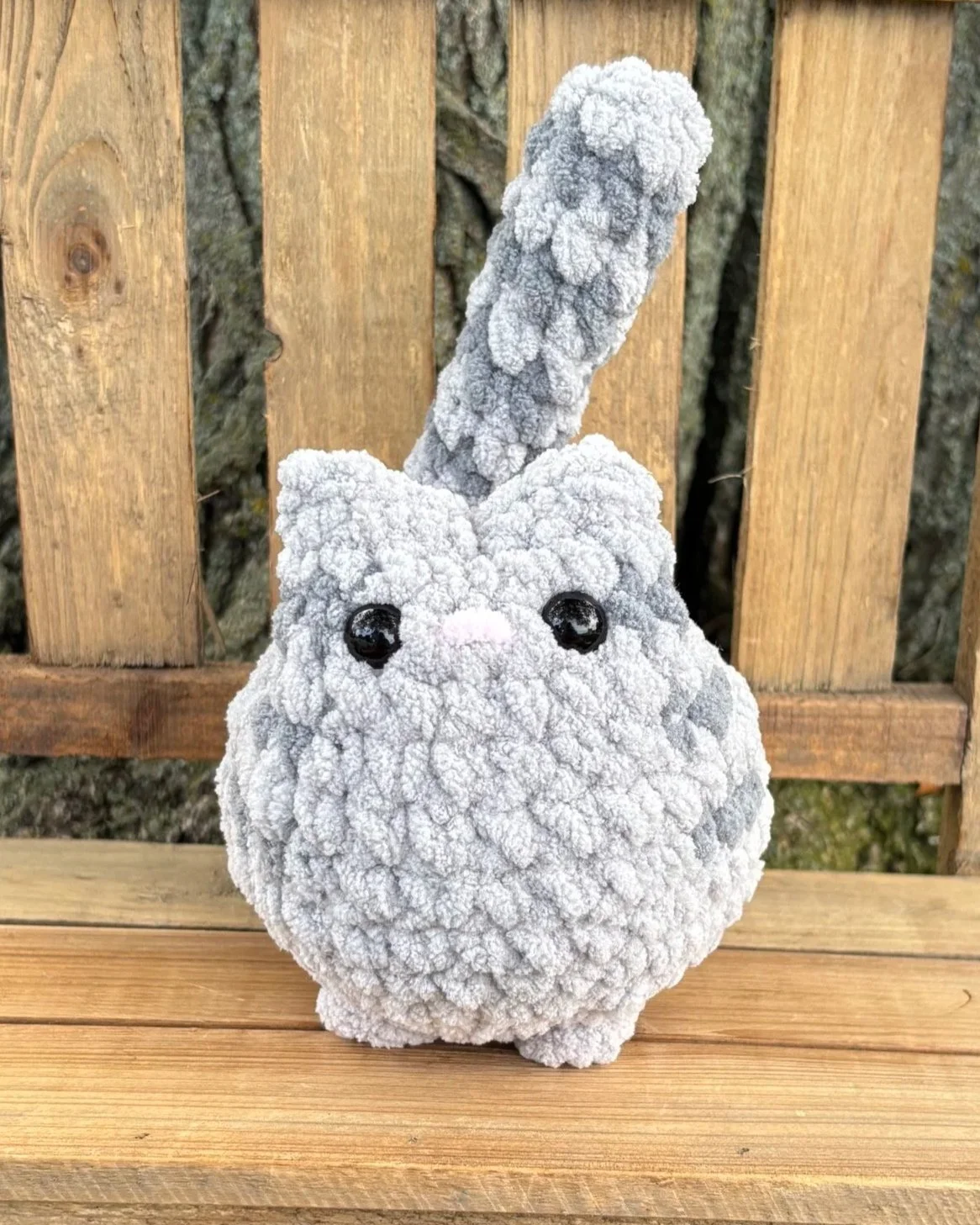 Close up of crochet tabby plushie face