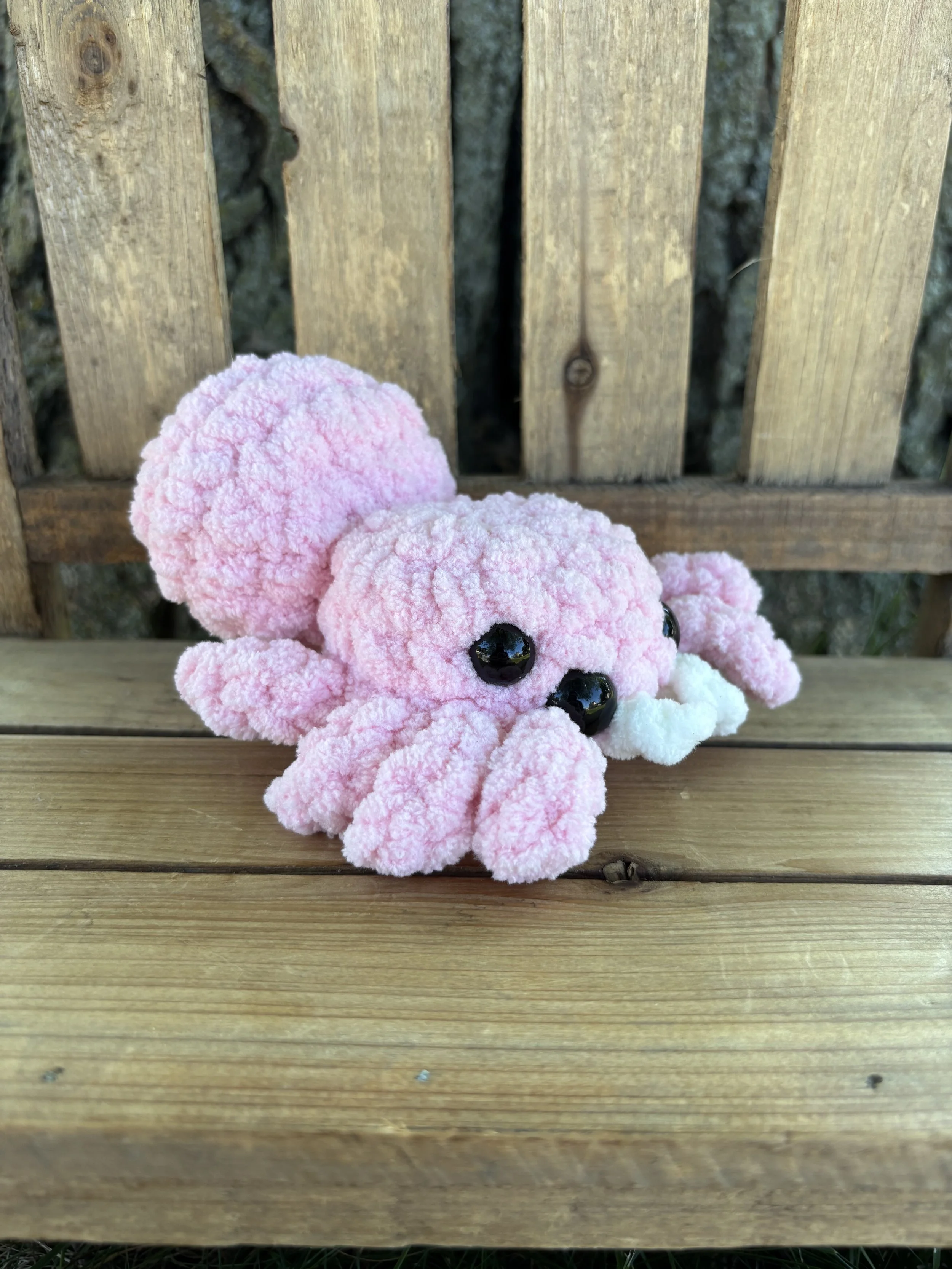 Handmade crochet pink jumping spider plushie