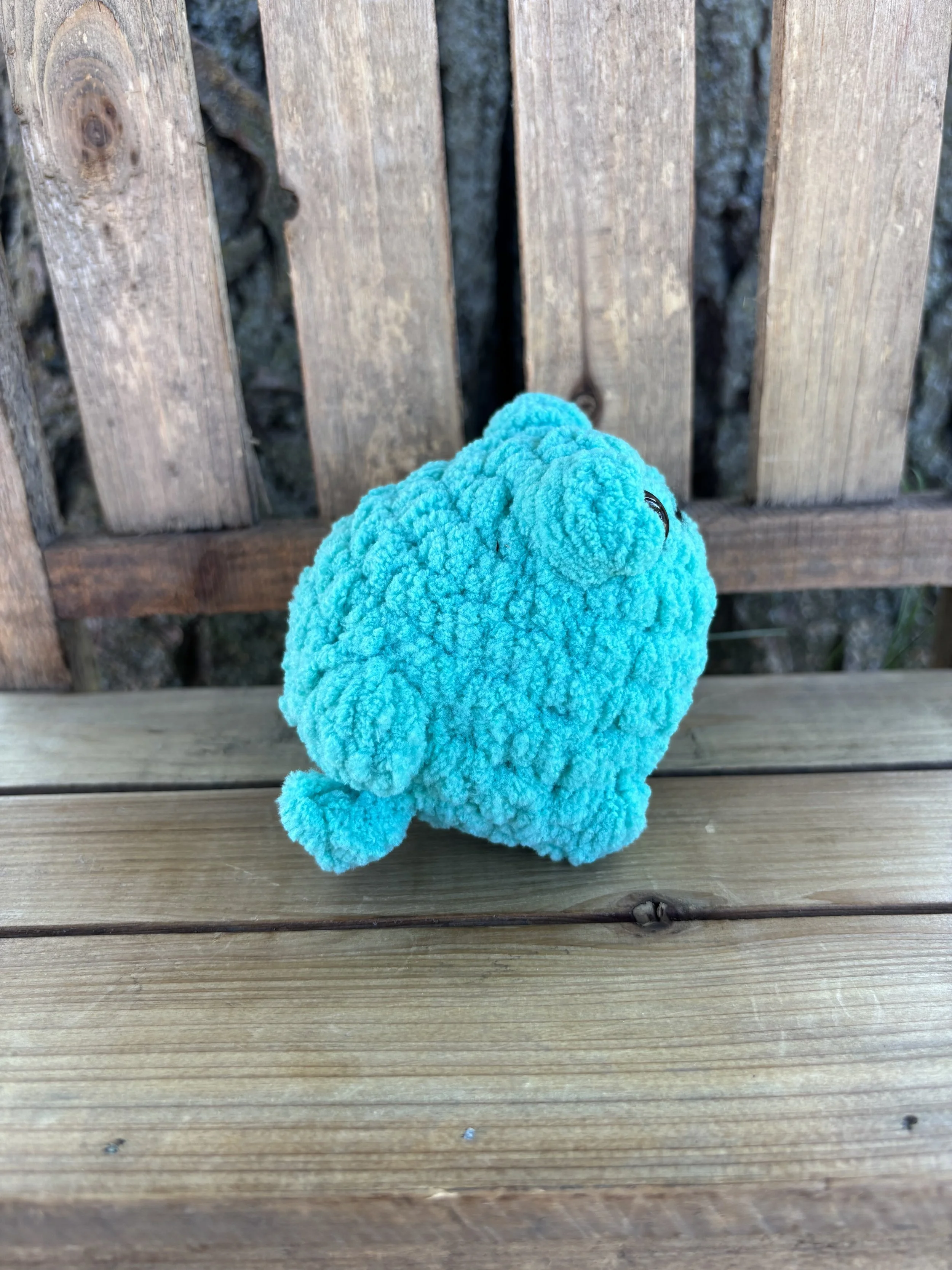 Handmade crochet teal jumping frog plushie