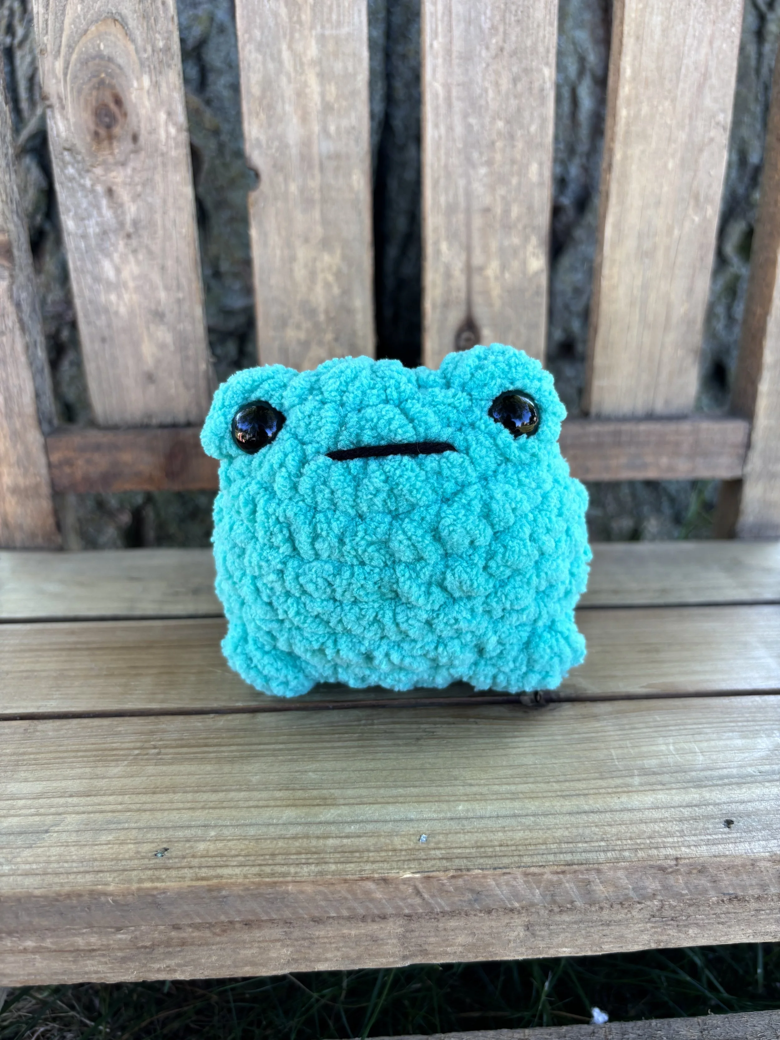Handmade crochet teal jumping frog plushie