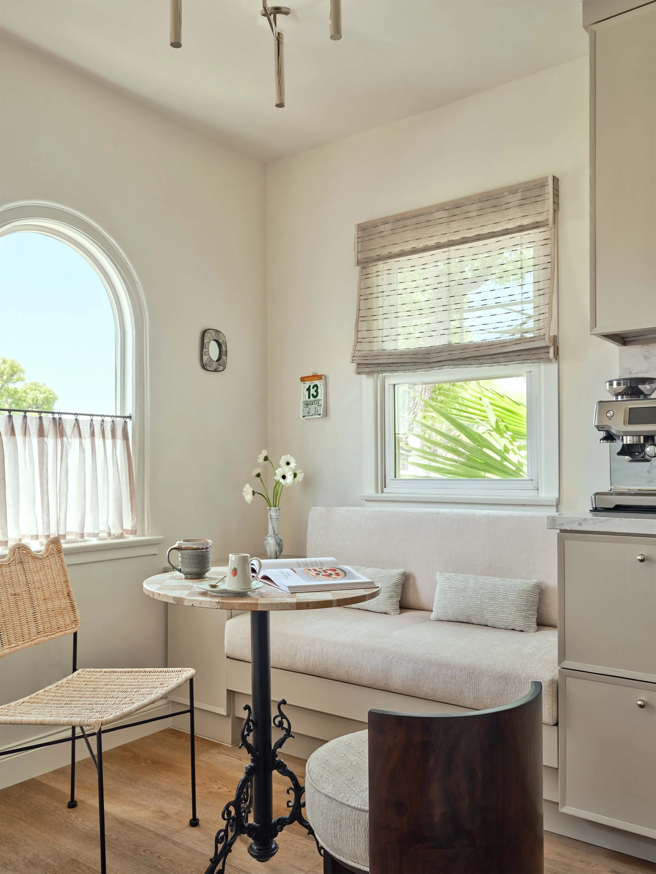 Custom banquette seating with vintage finds.