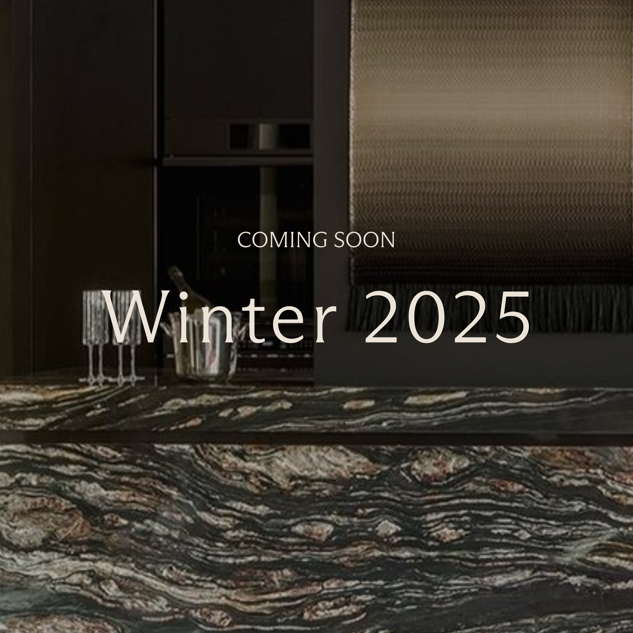Modern kitchen countertop with dark marbled pattern, empty glasses, and "Coming Soon Winter 2025" text overlay. Interior design luxury residential project in Los Angeles Glendale