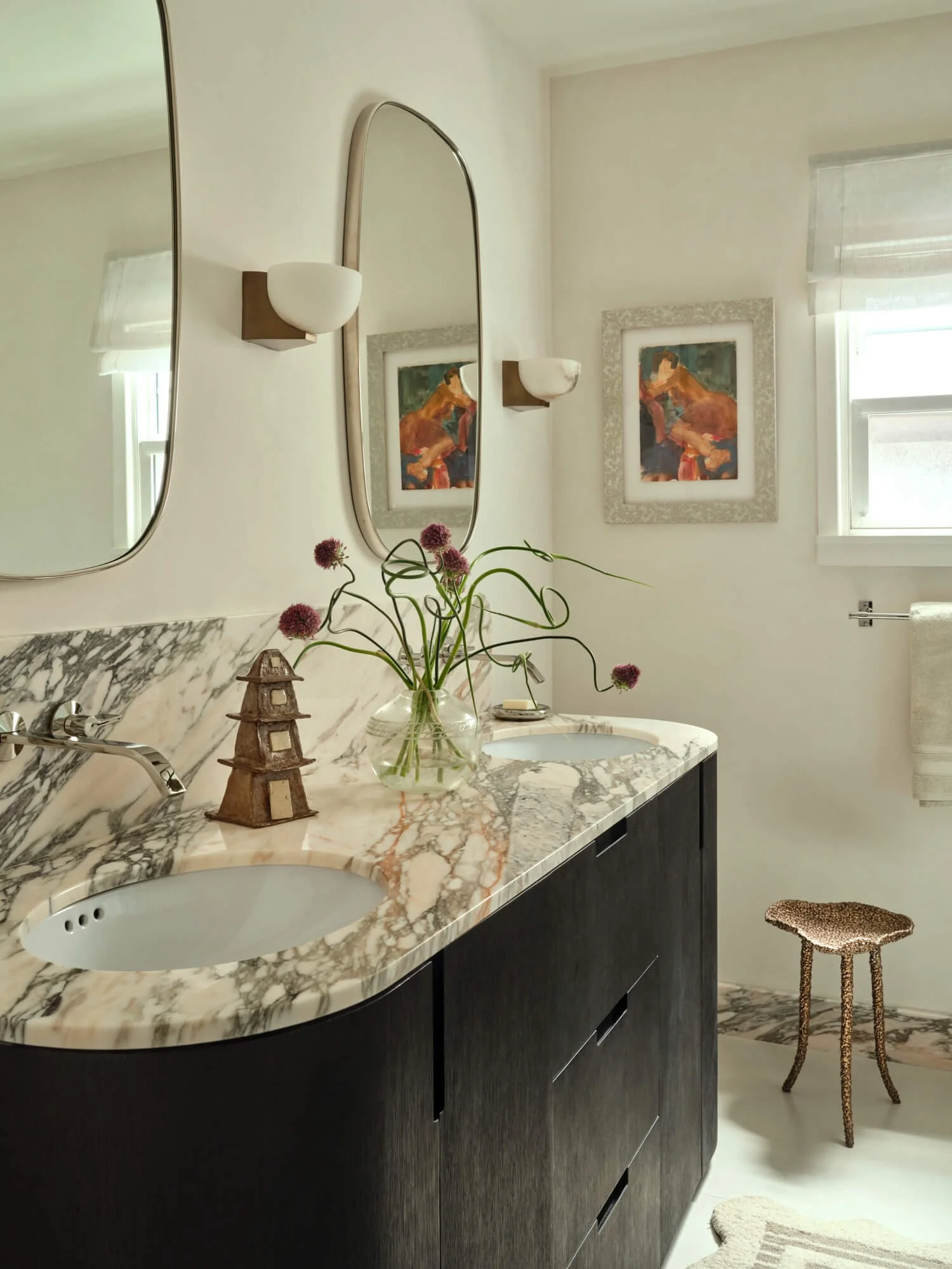 Calacatta rosa marble countertop with black oak cabinet