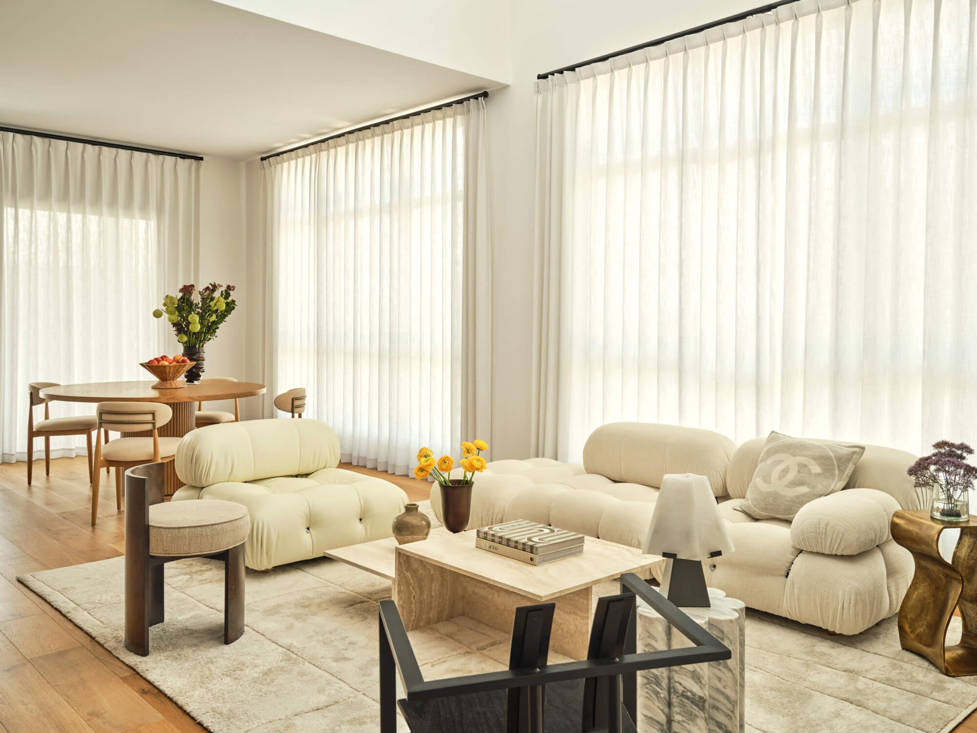 B&B Italia Camaleonda Sofa paired with Fermliving coffee table and vintage chairs