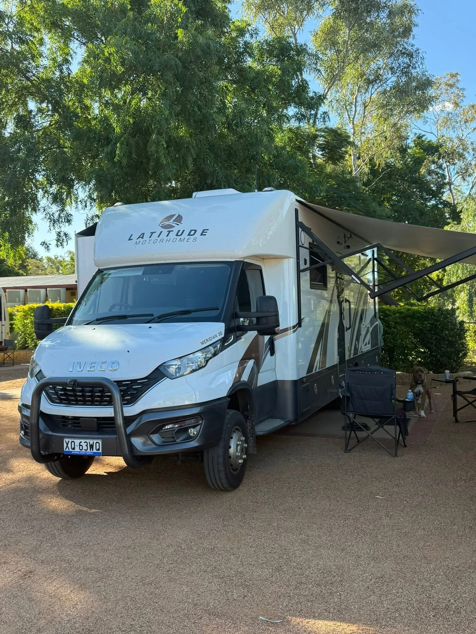 Latitude campsite with awning and chairs