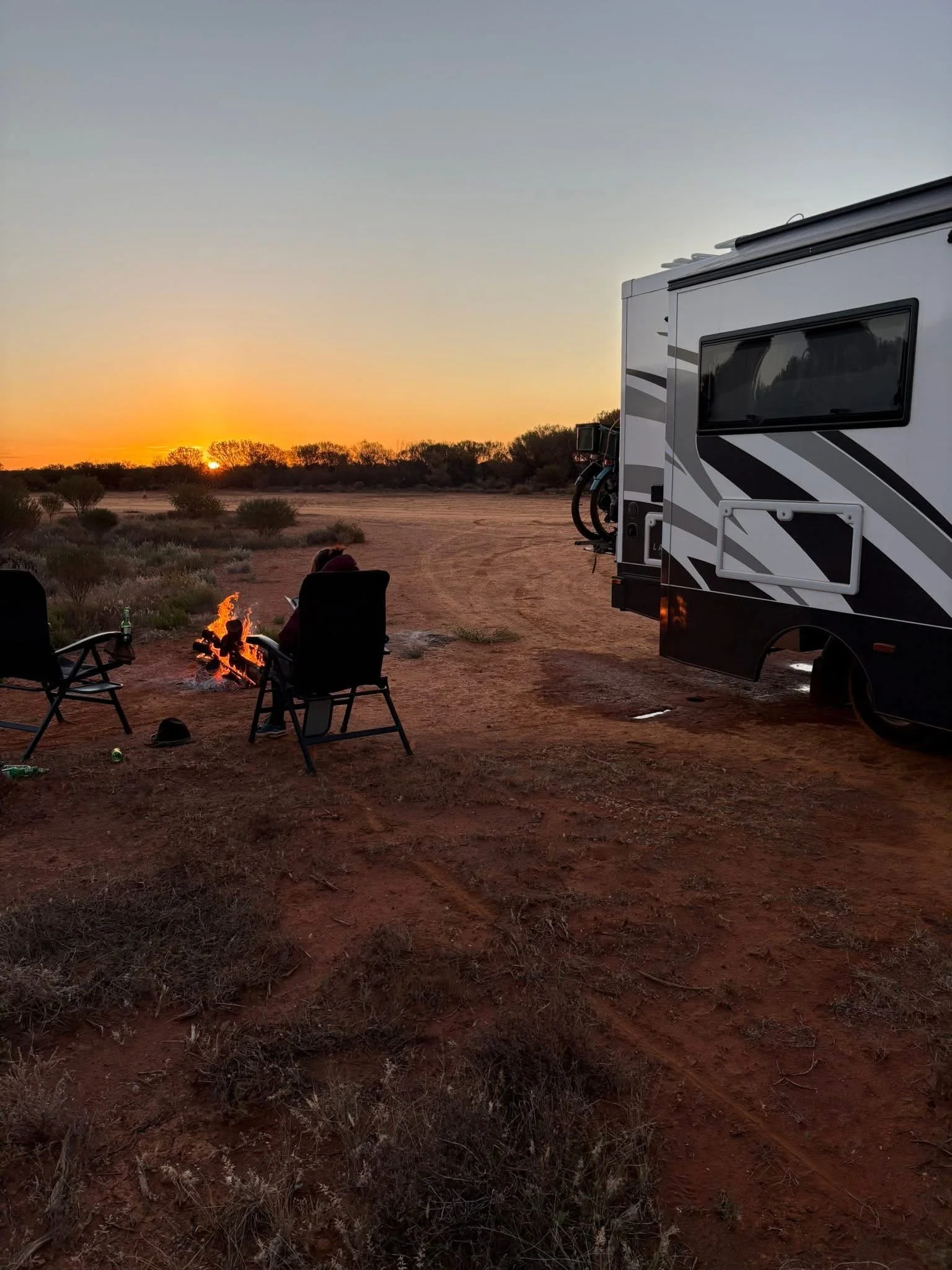 Camping beside a Latitude at the fire