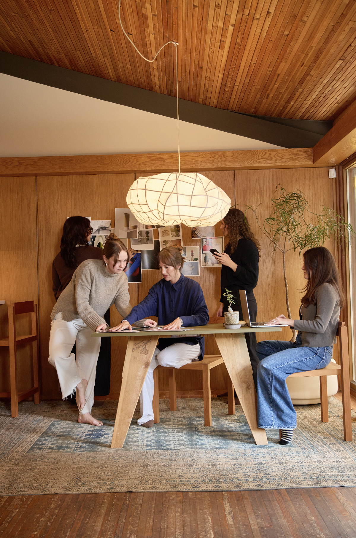 White & Salt design team collaborating in a creative studio.