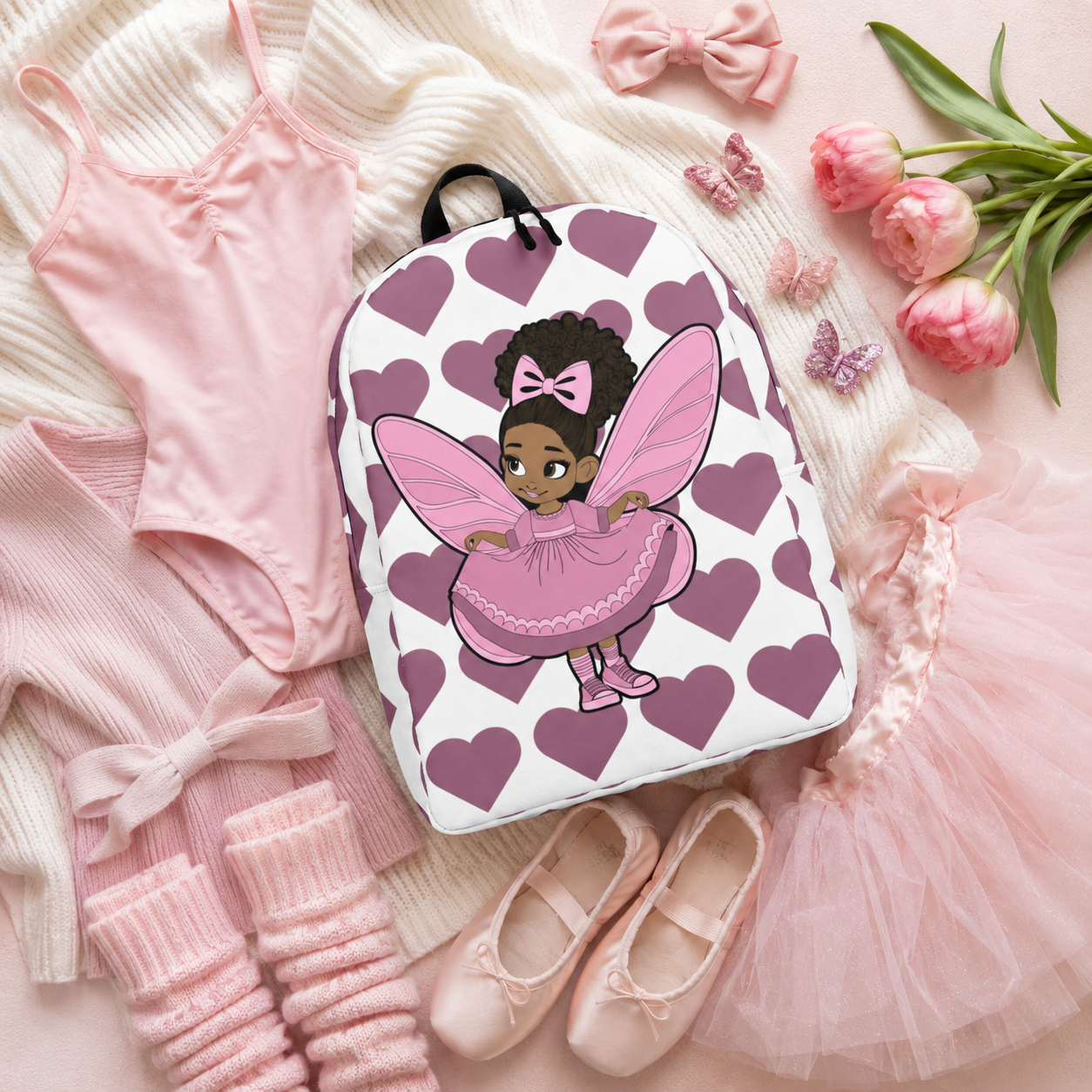 Darling Daphne Pixie Backpack by Coco Pixies with a pink pixie, curly afro puff and mauve heart pattern.