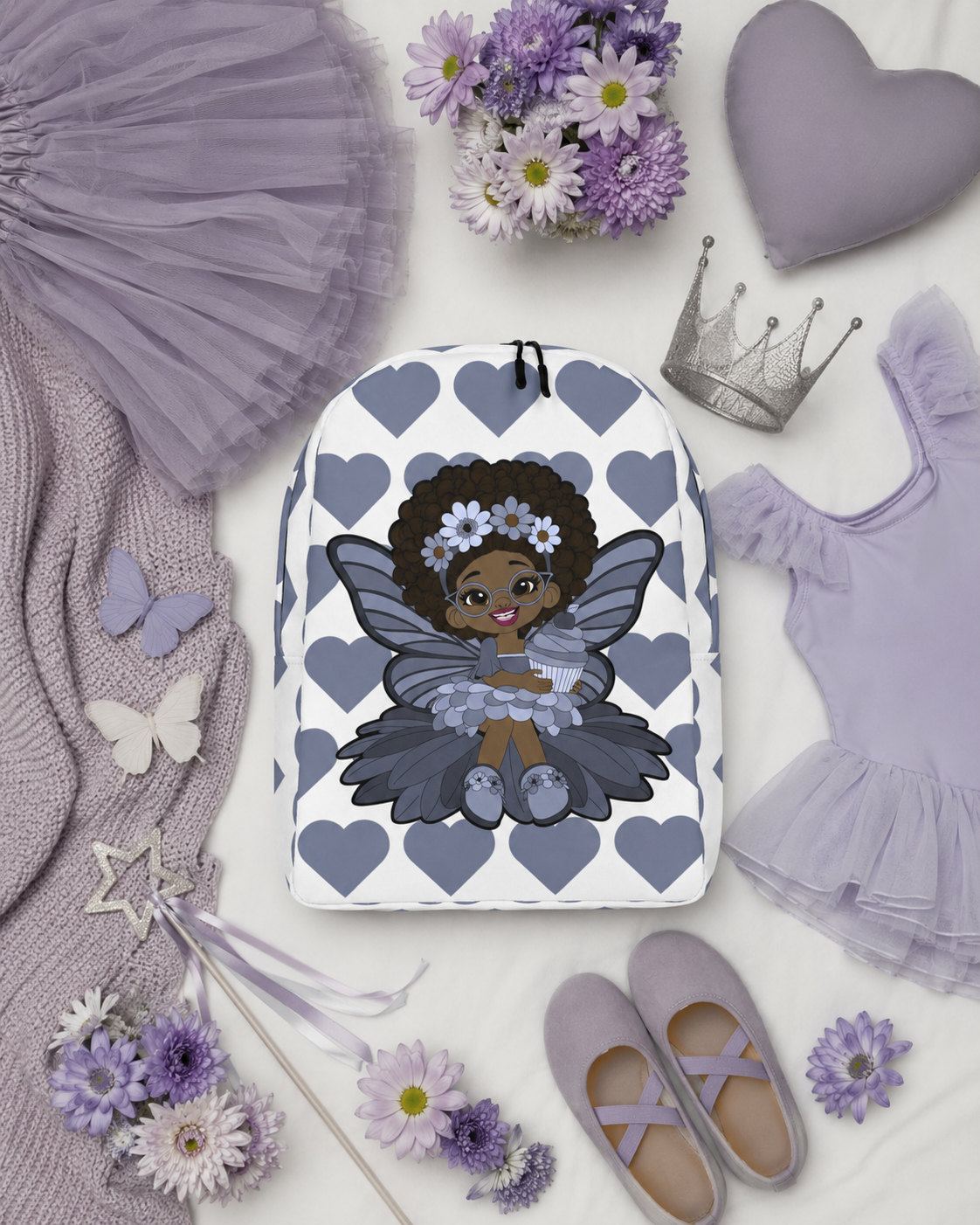 Bubbly Brooke Pixie Backpack by Coco Pixies with a Black girl pixie, cupcake and slate-blue signature heart pattern