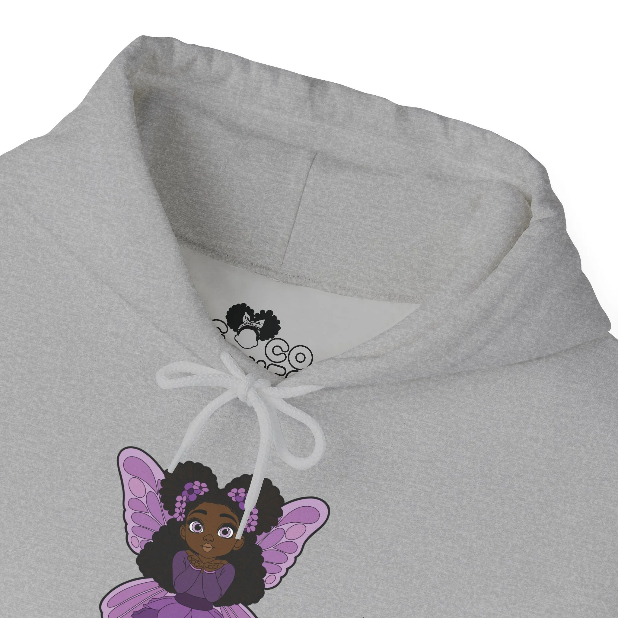 Amber Amazingpuff Women’s Hoodie Sweatshirt by COCO PIXIES featuring a whimsical Black pixie with natural afro puffs, purple wings, and a layered purple dress printed on a soft adult pullover hoodie.