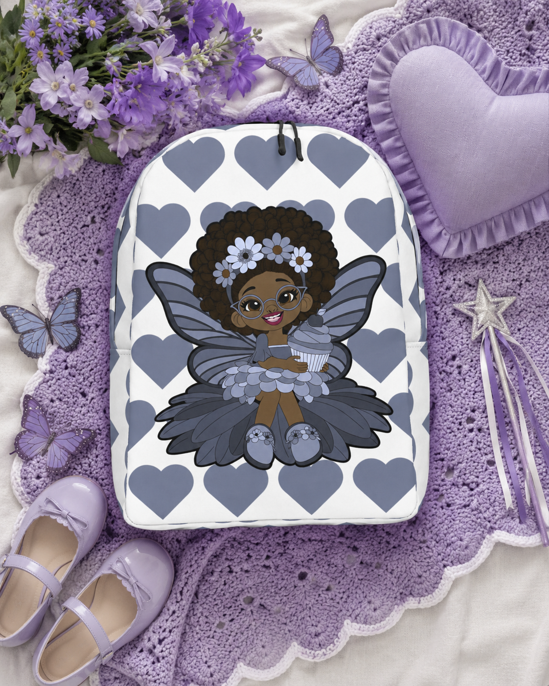 Bubbly Brooke Pixie Backpack by Coco Pixies with a Black girl pixie, cupcake and slate-blue signature heart pattern