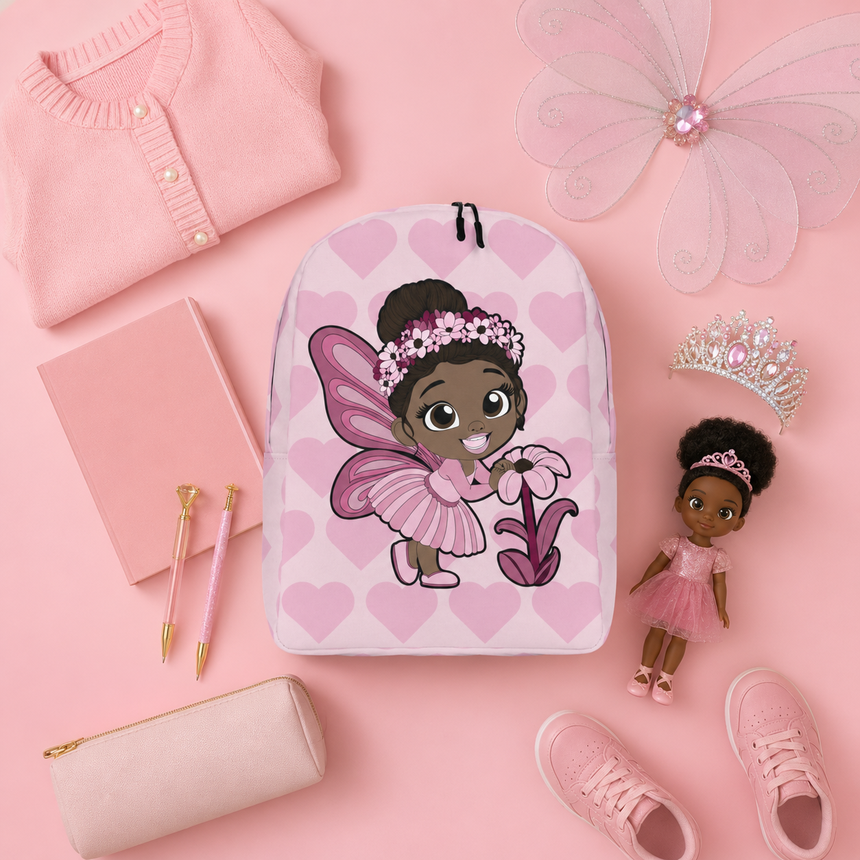 Coco Pixies Tara Twinkle girls backpack featuring a Black pixie, pink wings and blush heart pattern
