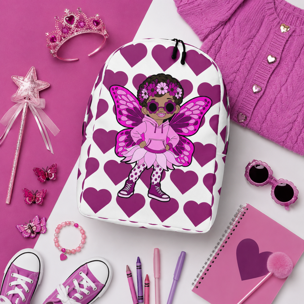 Coco Pixies Teonna Twinklepuff backpack featuring a Black girl pixie with curly puffs, a floral crown and magenta hearts.