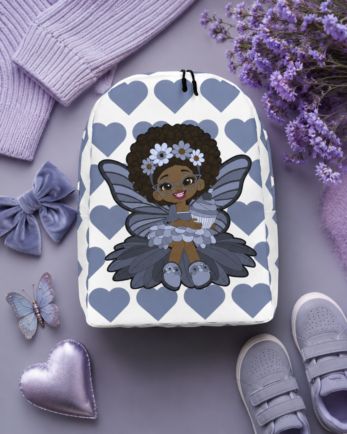 Bubbly Brooke Pixie Backpack by Coco Pixies with a Black girl pixie, cupcake and slate-blue signature heart pattern