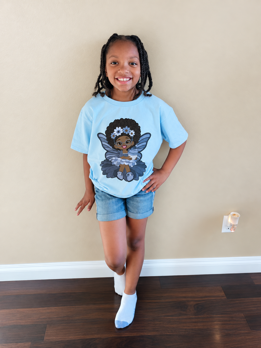 Little Black girl posing for a picture wearing her Bubbly Brooke Pixie Signature Shirt - Coco Pixies Character Graphic T-Shirt, KIDS SIZE