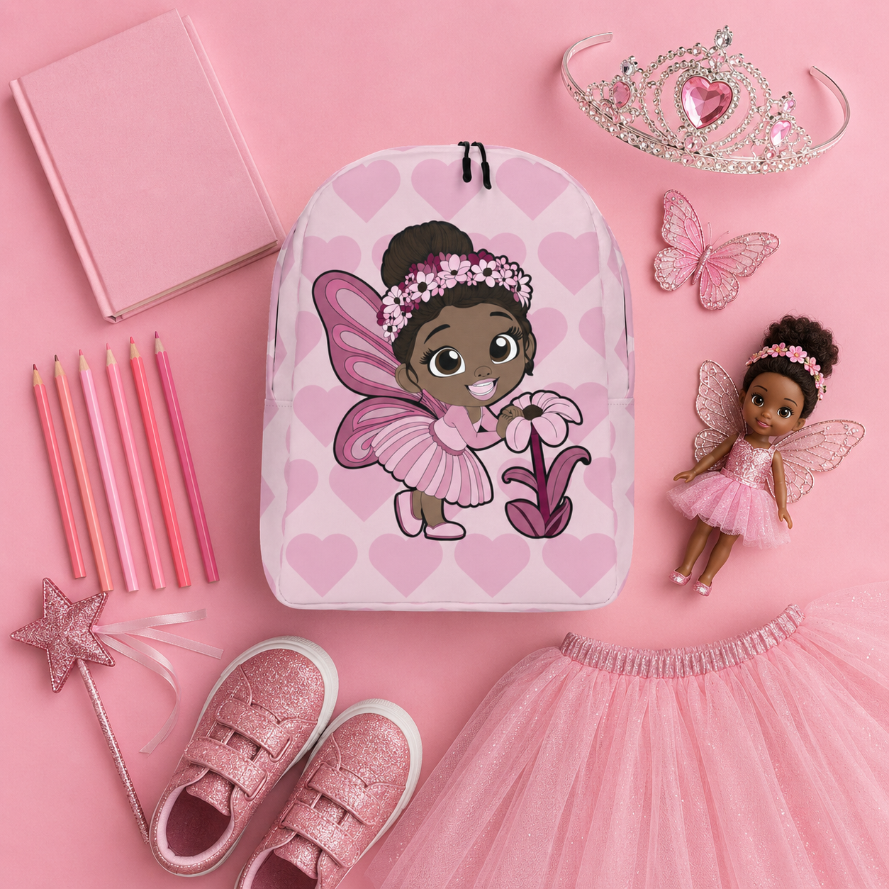 Coco Pixies Tara Twinkle girls backpack featuring a Black pixie, pink wings and blush heart pattern