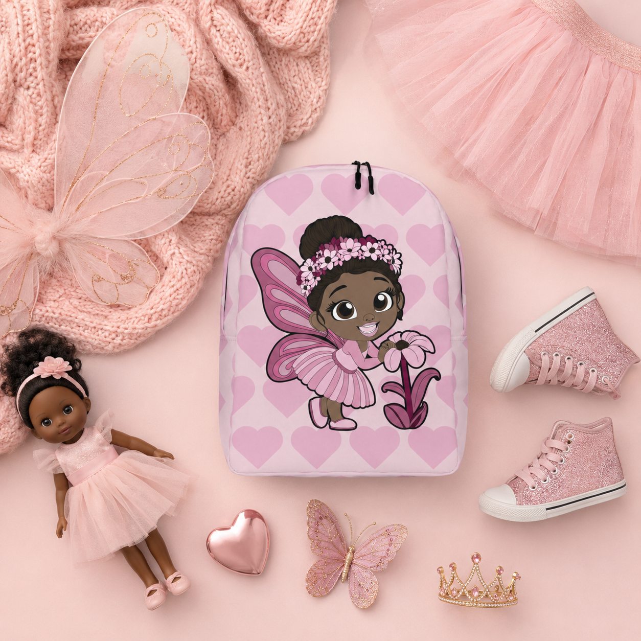 Coco Pixies Tara Twinkle girls backpack featuring a Black pixie, pink wings and blush heart pattern