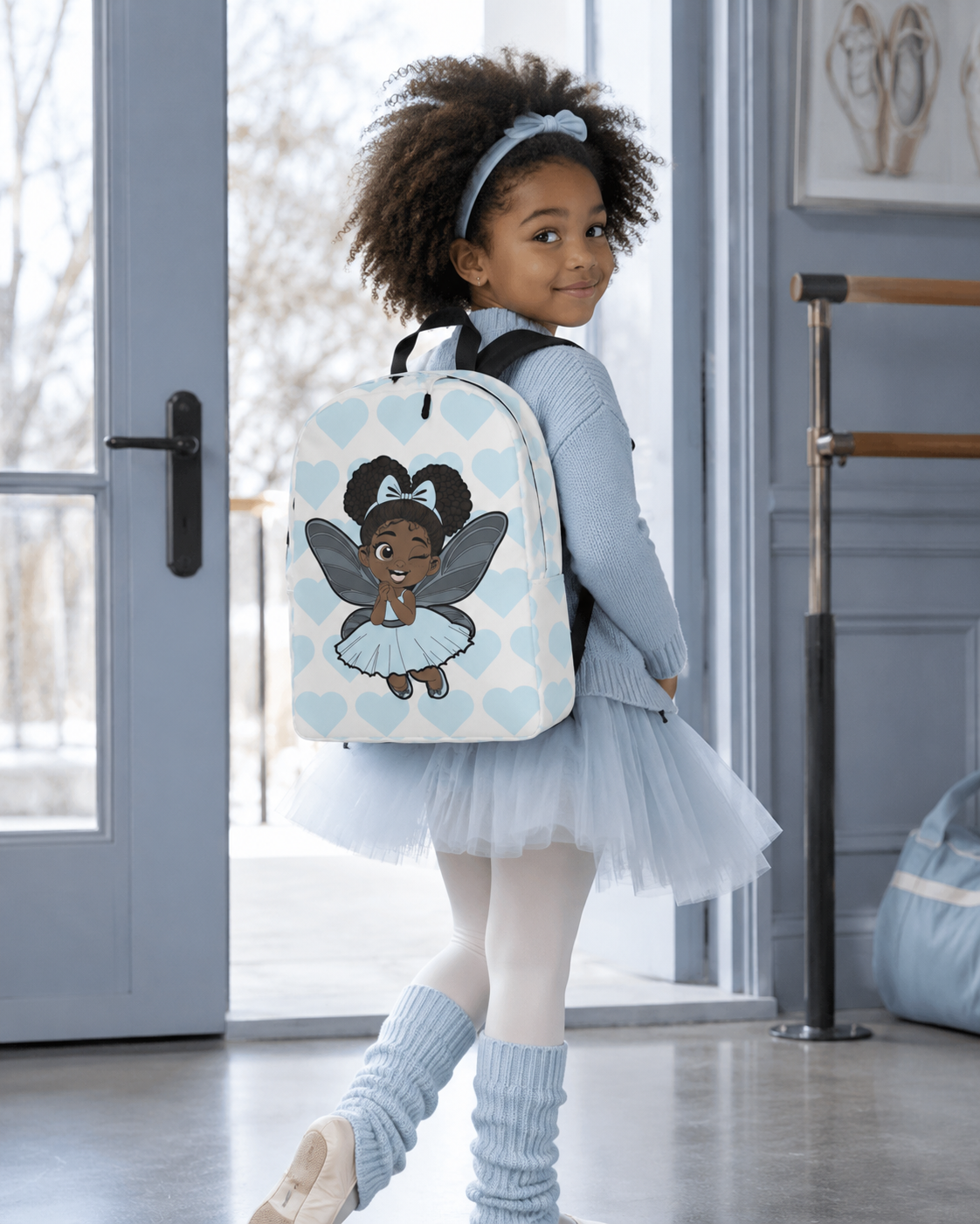 Gleeful Grace Pixie Backpack by Coco Pixies with aqua hearts, afro puffs, wings, and a white background