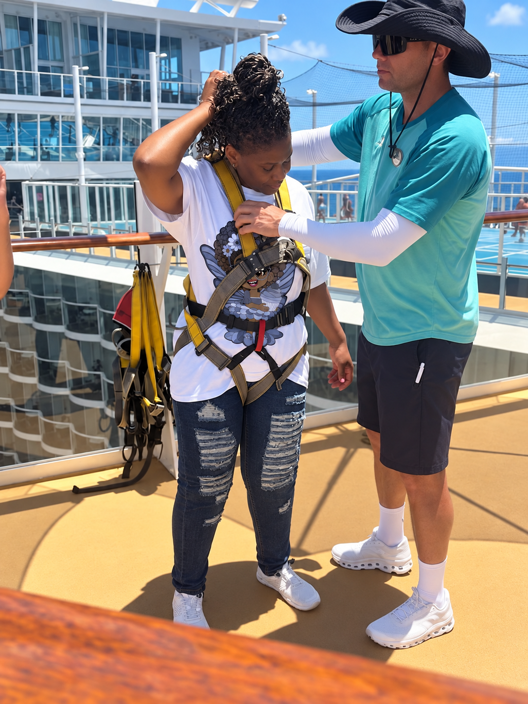 Black woman on a cruise being prepped to zip line wearing her Bubbly Brooke Pixie Signature Shirt - Coco Pixies Character Graphic T-Shirt, ADULT SIZE