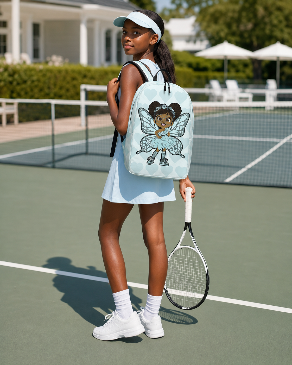 Coco Pixies JoJo Jollypuff backpack featuring afro puffs, round glasses, baby cyan wings, and heart pattern