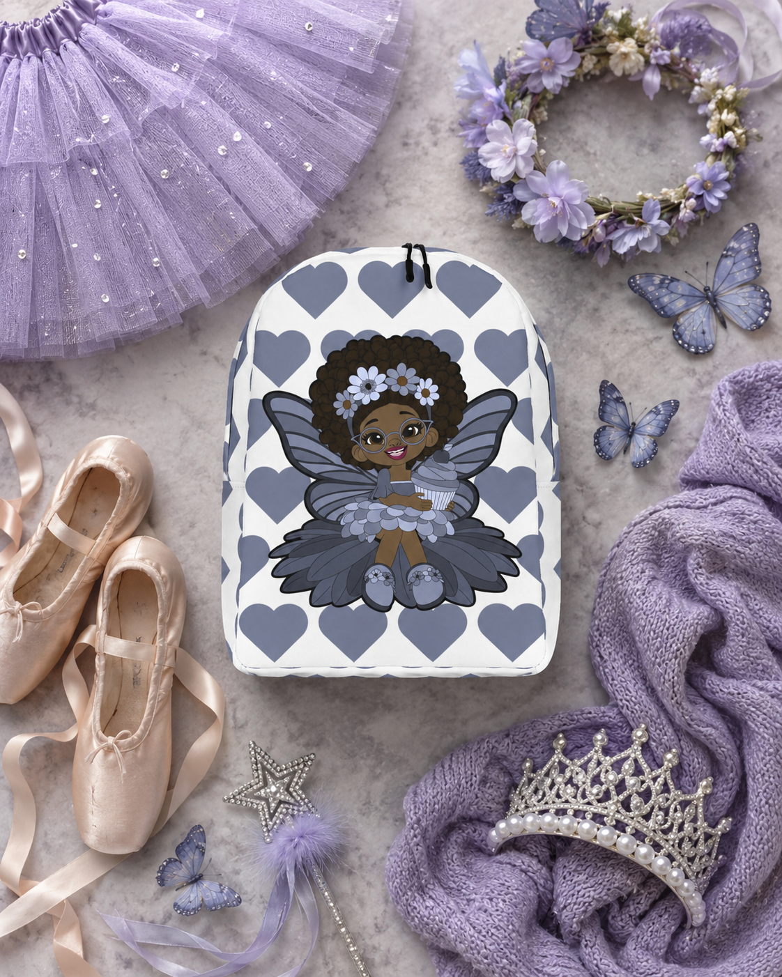 Bubbly Brooke Pixie Backpack by Coco Pixies with a Black girl pixie, cupcake and slate-blue signature heart pattern