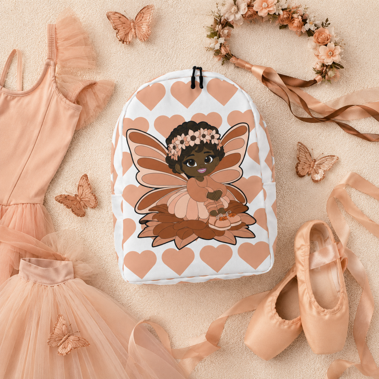 Coco Pixies Signature Heart Pattern Backpack featuring Sweet Sienna, a Black pixie with curls and peach wings