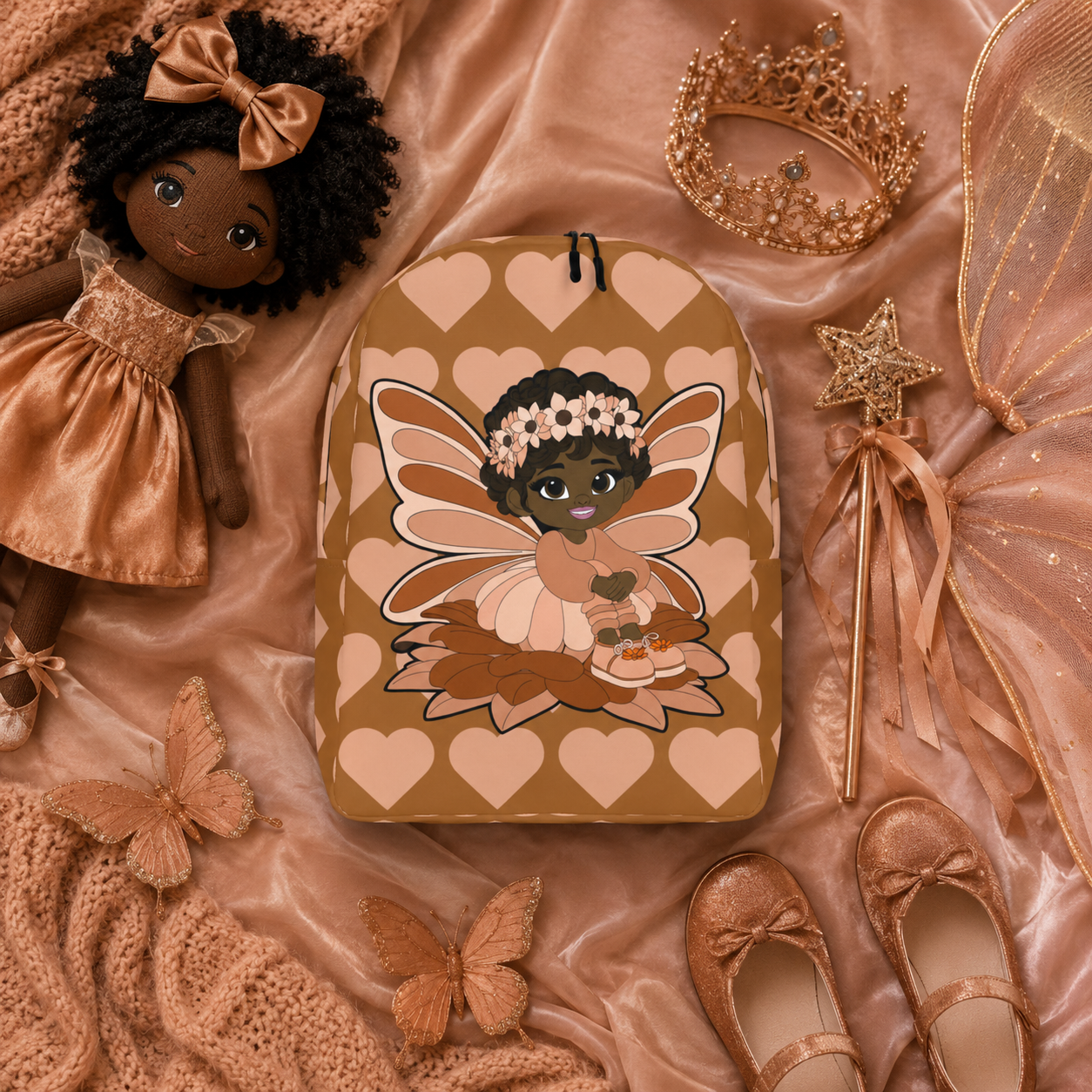 Coco Pixies Sweet Sienna school backpack featuring a Black pixie, floral crown, wings, and mocha heart pattern