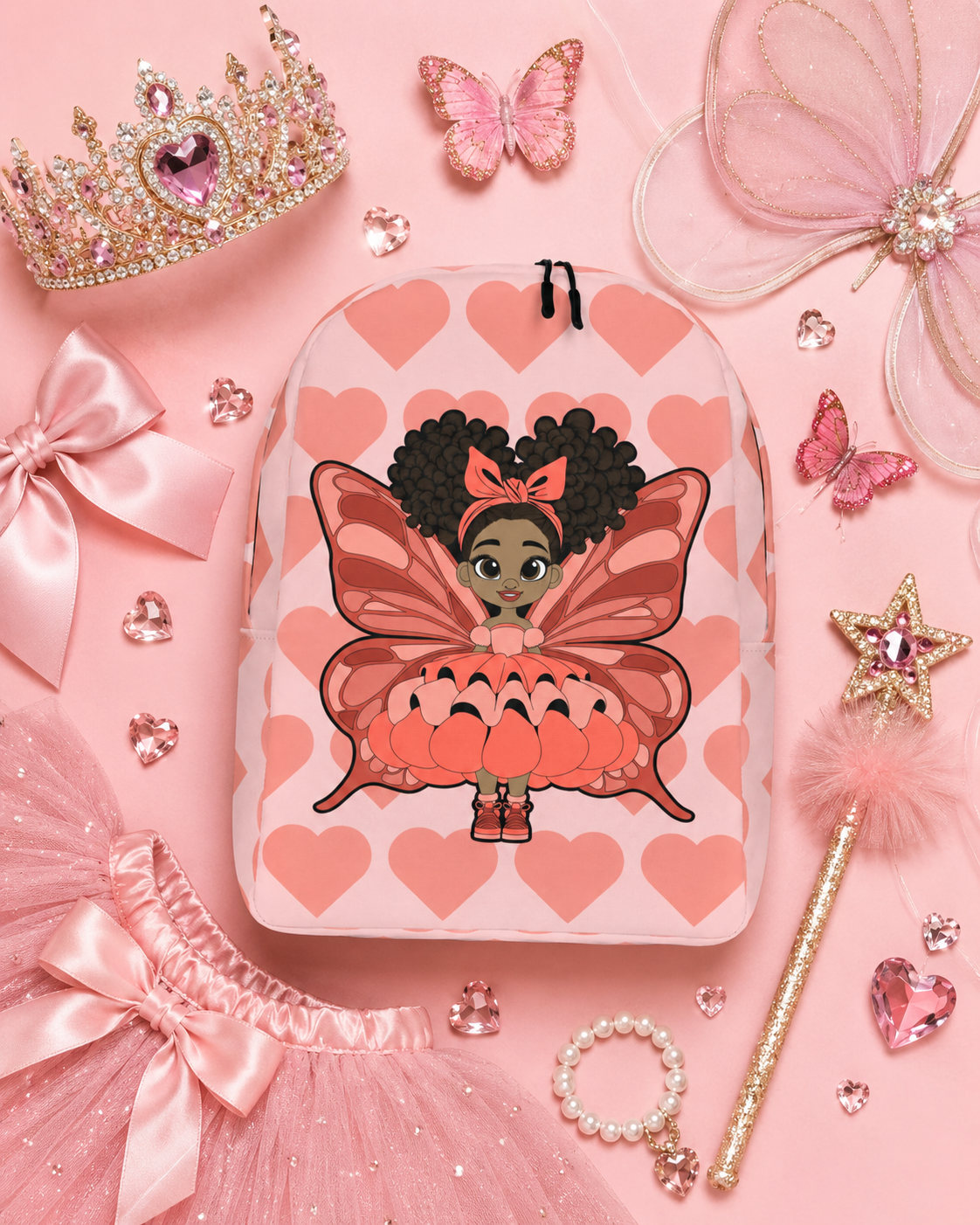 Coco Pixies Lovely Layla children’s backpack featuring a Black girl pixie and Coral Signature Heart Pattern