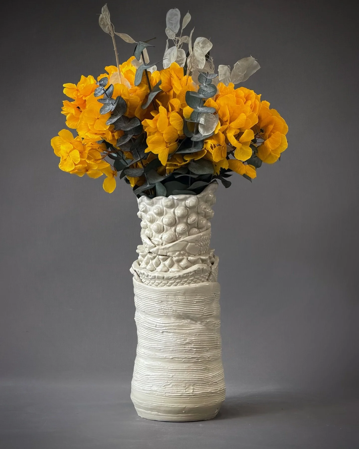 These forms are built from individual clay elements - wrapped, stacked, and joined together.

I leave the structure exposed. Seams and transitions aren&rsquo;t concealed; they become part of the work&rsquo;s language - like repairs, like accumulated 