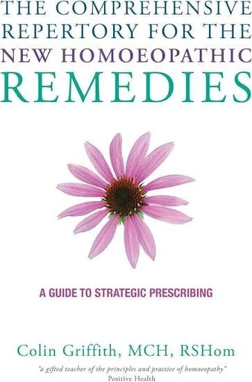 Book cover titled 'The Comprehensive Repertory for the New Homoeopathic Remedies', featuring a pink flower, with the subtitle 'A Guide to Strategic Prescribing', by Colin Griffith.
