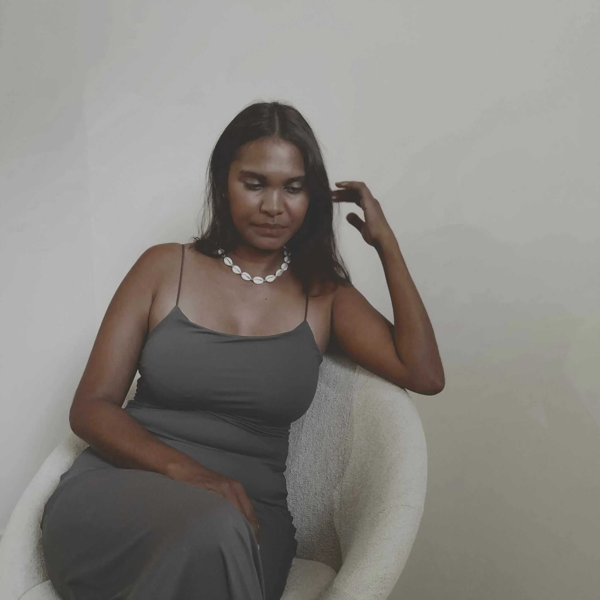 Aïsha de Barros Lopes, Certified Somatic Sex Coach guiding clients through embodied awareness.