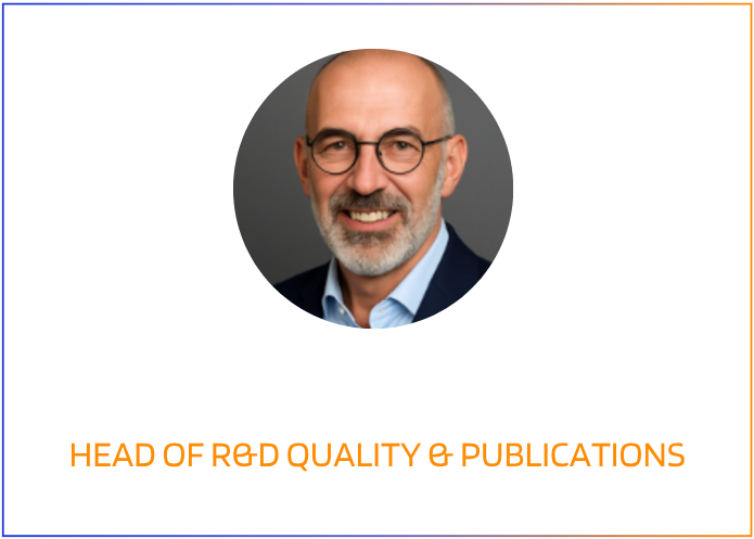 Close-up of a smiling middle-aged man with glasses, a gray beard and bald head, in a professional portrait style.