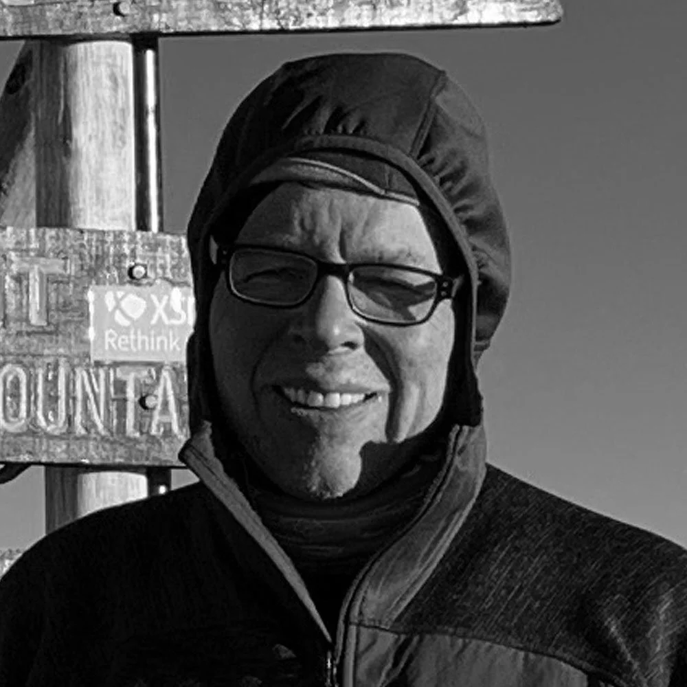David Thomlinson at the summit of Kilimanjaro