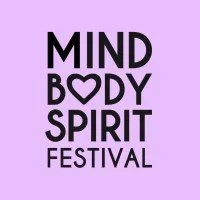 Text on purple background that reads "MIND BODY SPIRIT FESTIVAL" with a heart symbol in place of the letter 'O' in 'BODY'.
