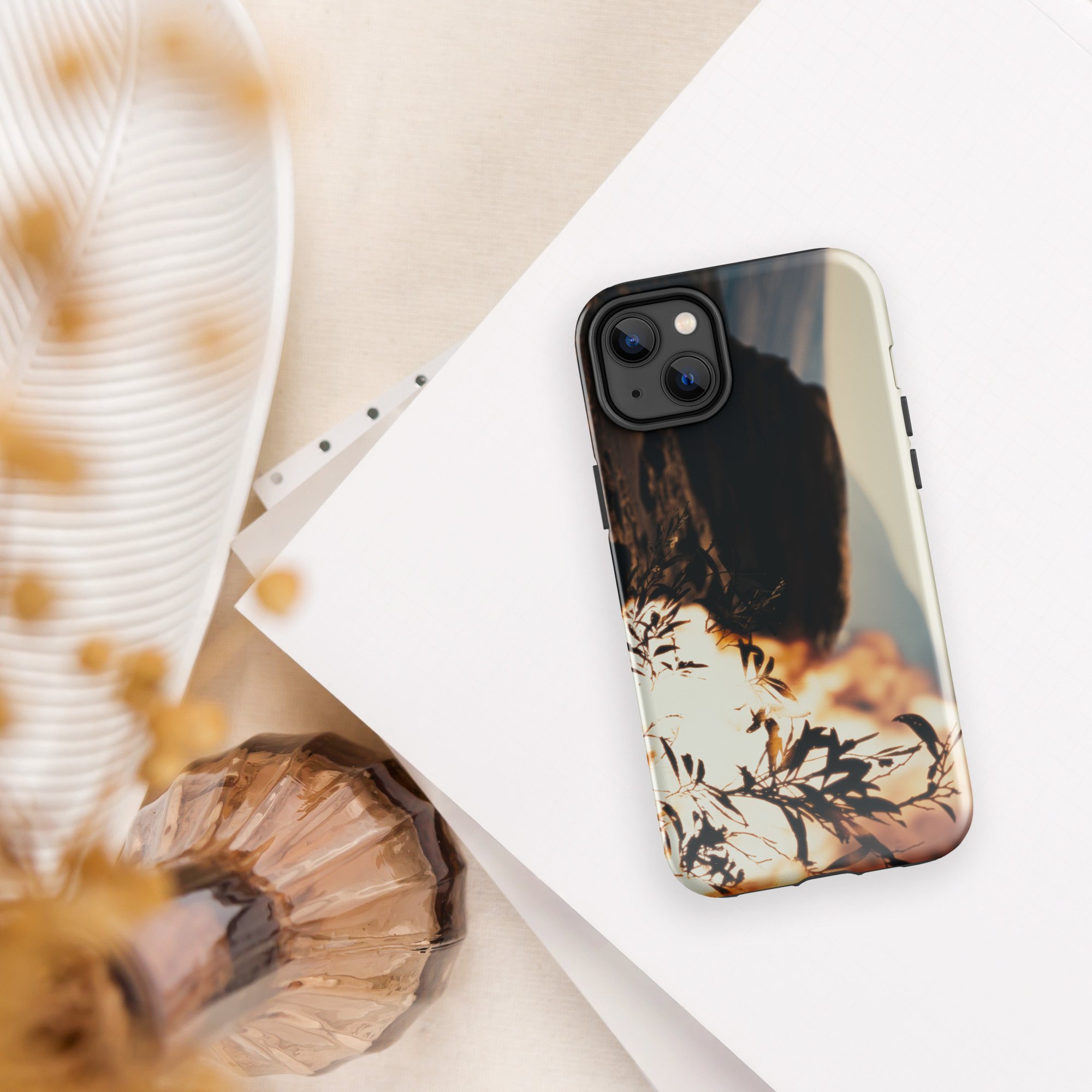 Back camera angle view of fiery Burning Bush artwork on a sleek iPhone case