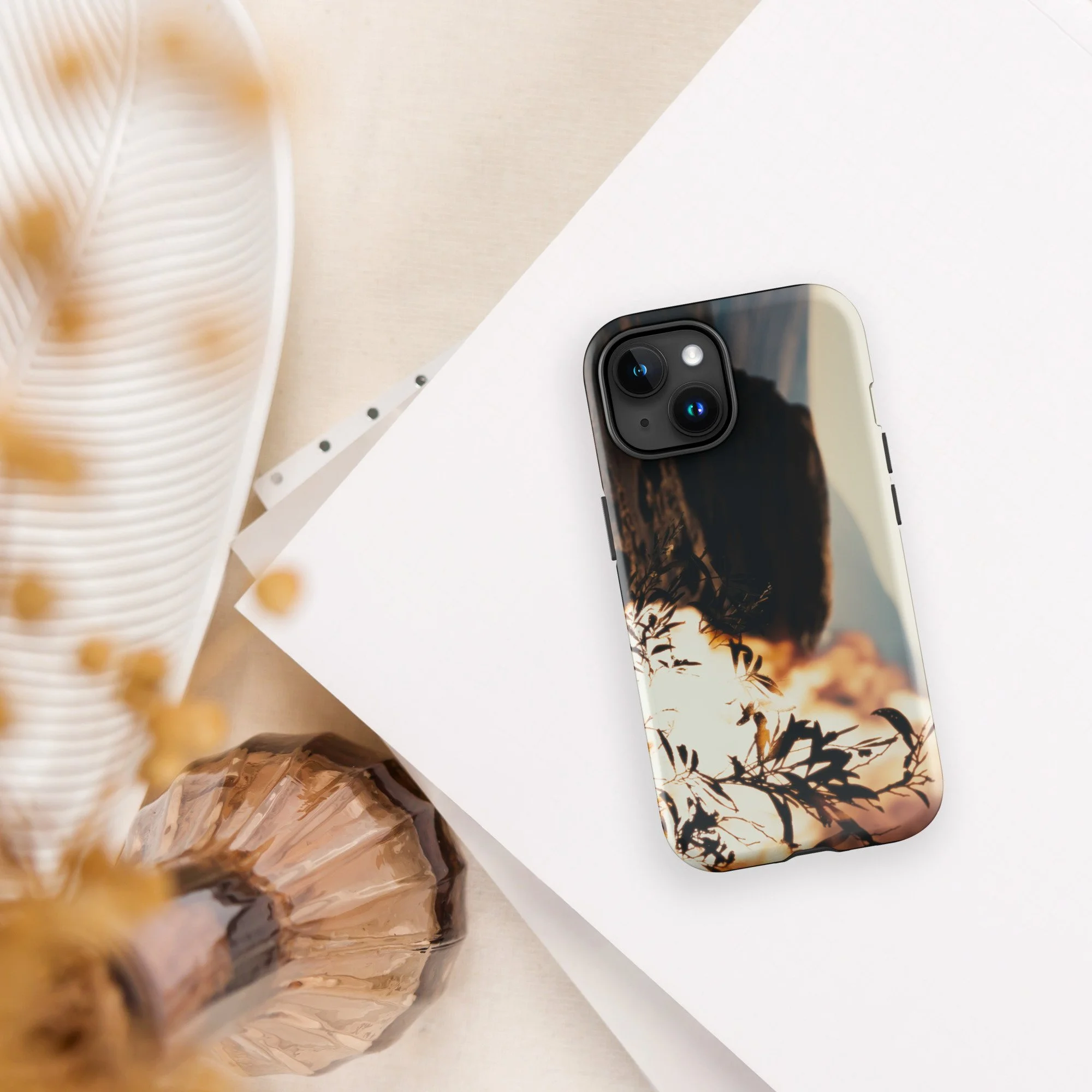 Back camera angle view of fiery Burning Bush artwork on a sleek iPhone case