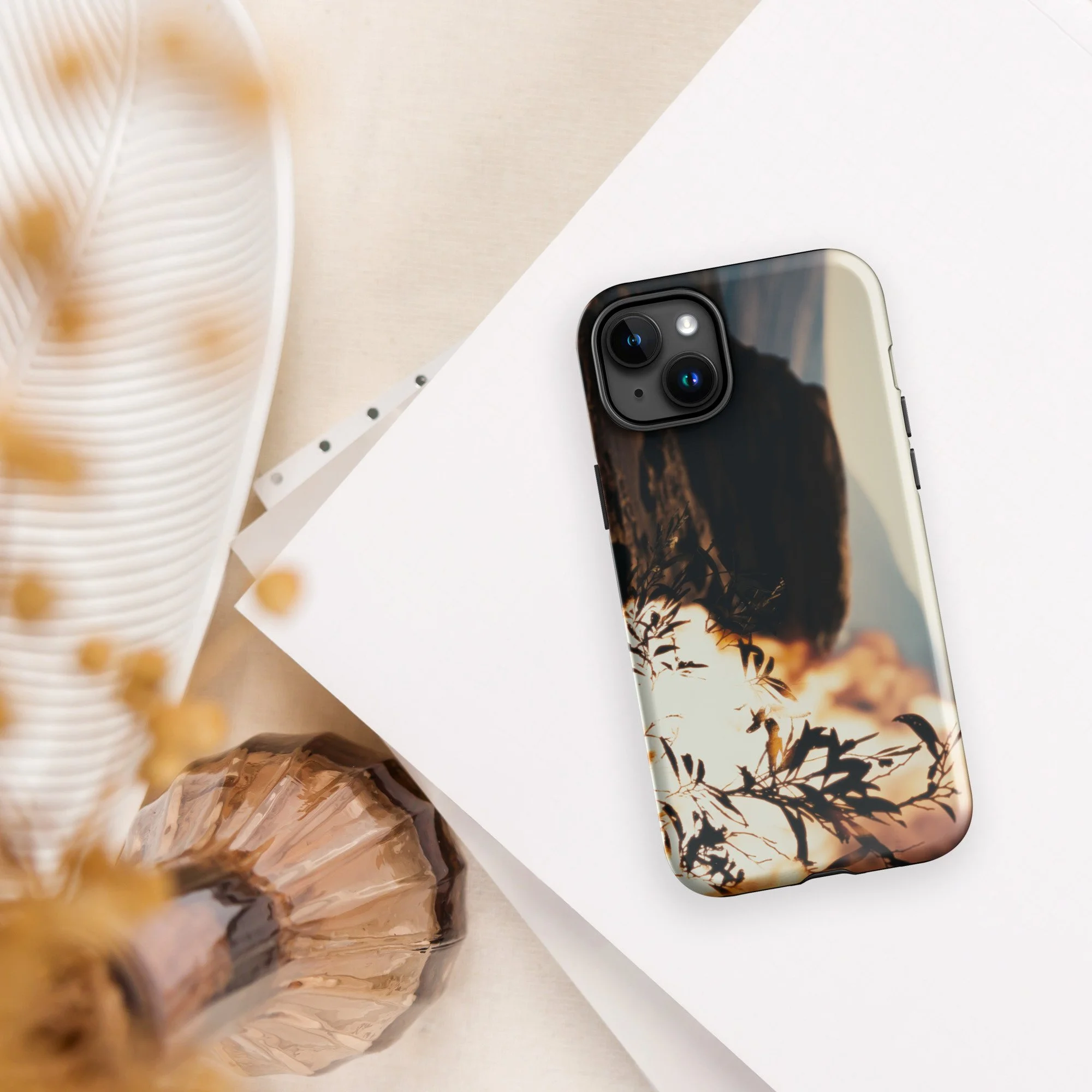 Back camera angle view of fiery Burning Bush artwork on a sleek iPhone case