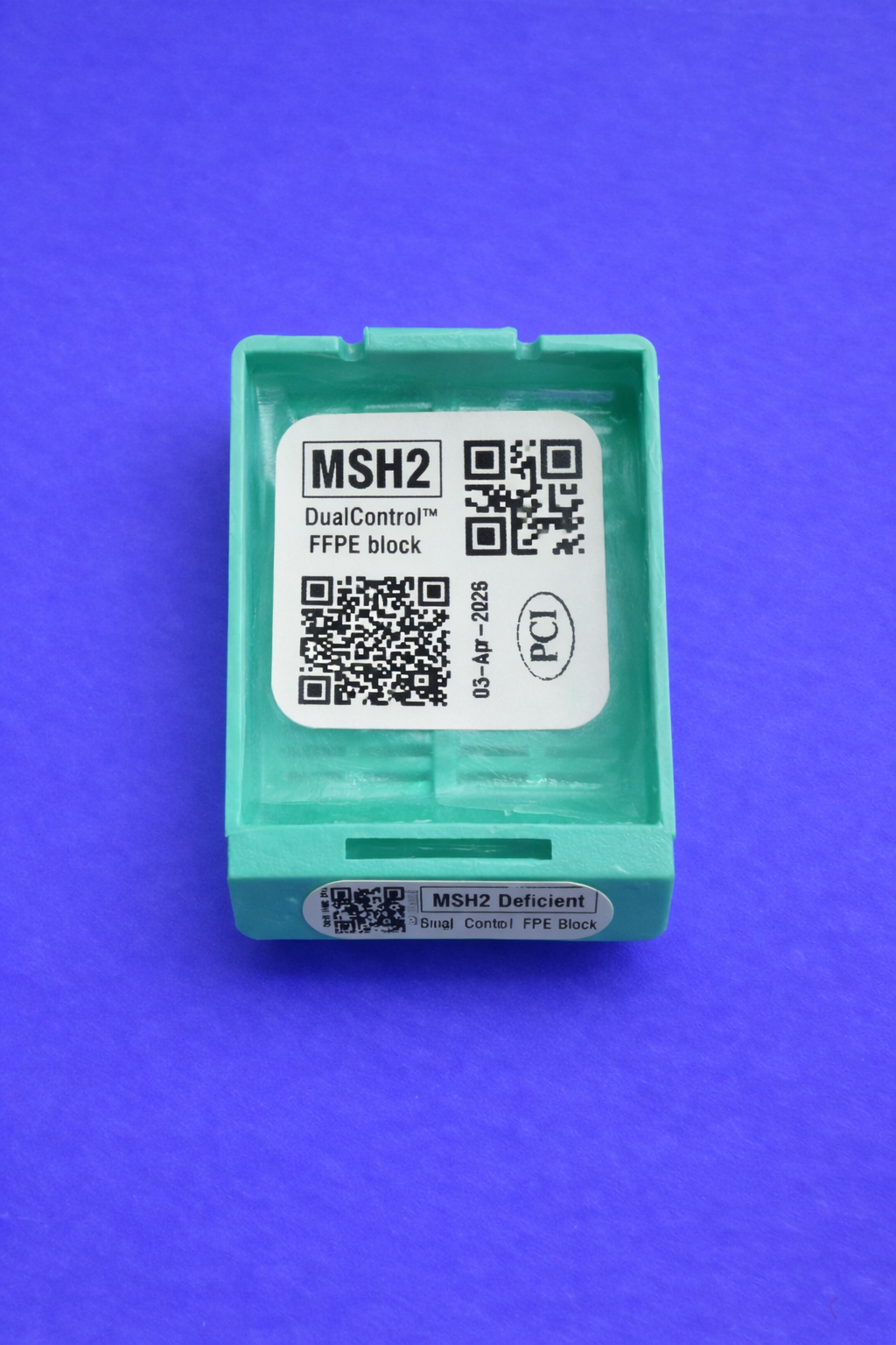 MSH2 DualControl container on blue background.png