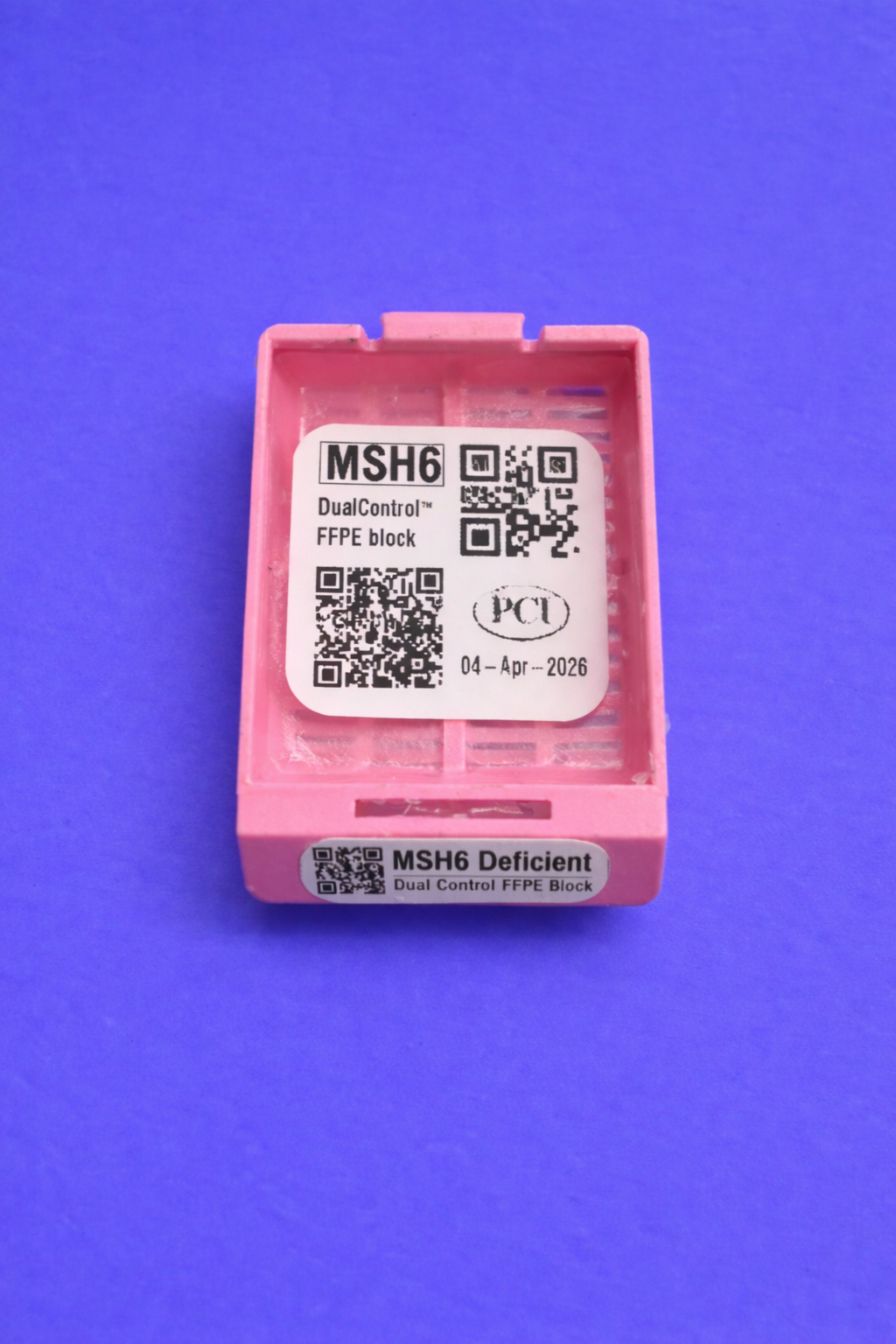 Pink FFPE tissue block cassette.png