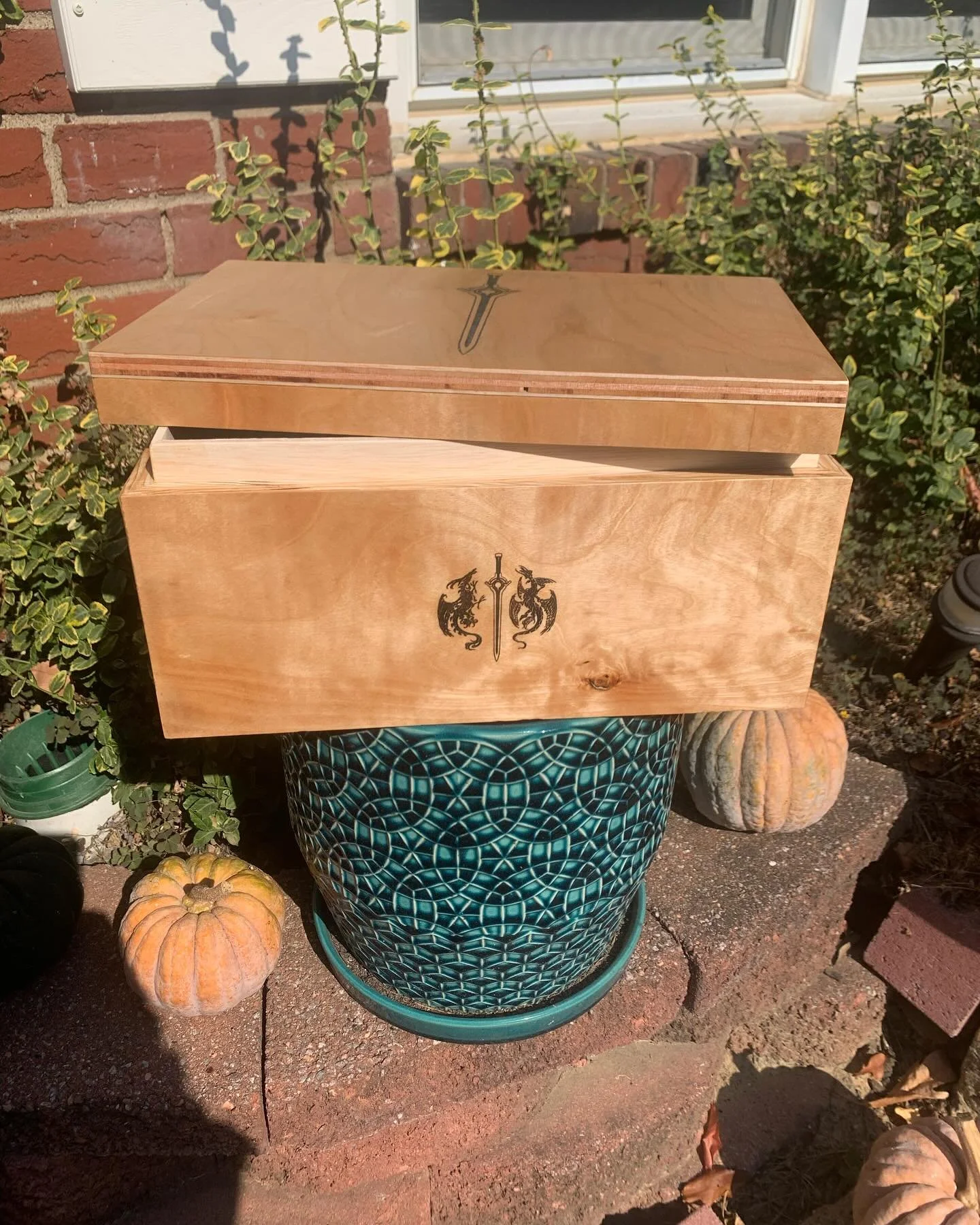 Storage box with engravings. First attempt at inlaying epoxy into the engraving, I think this turned out pretty good.