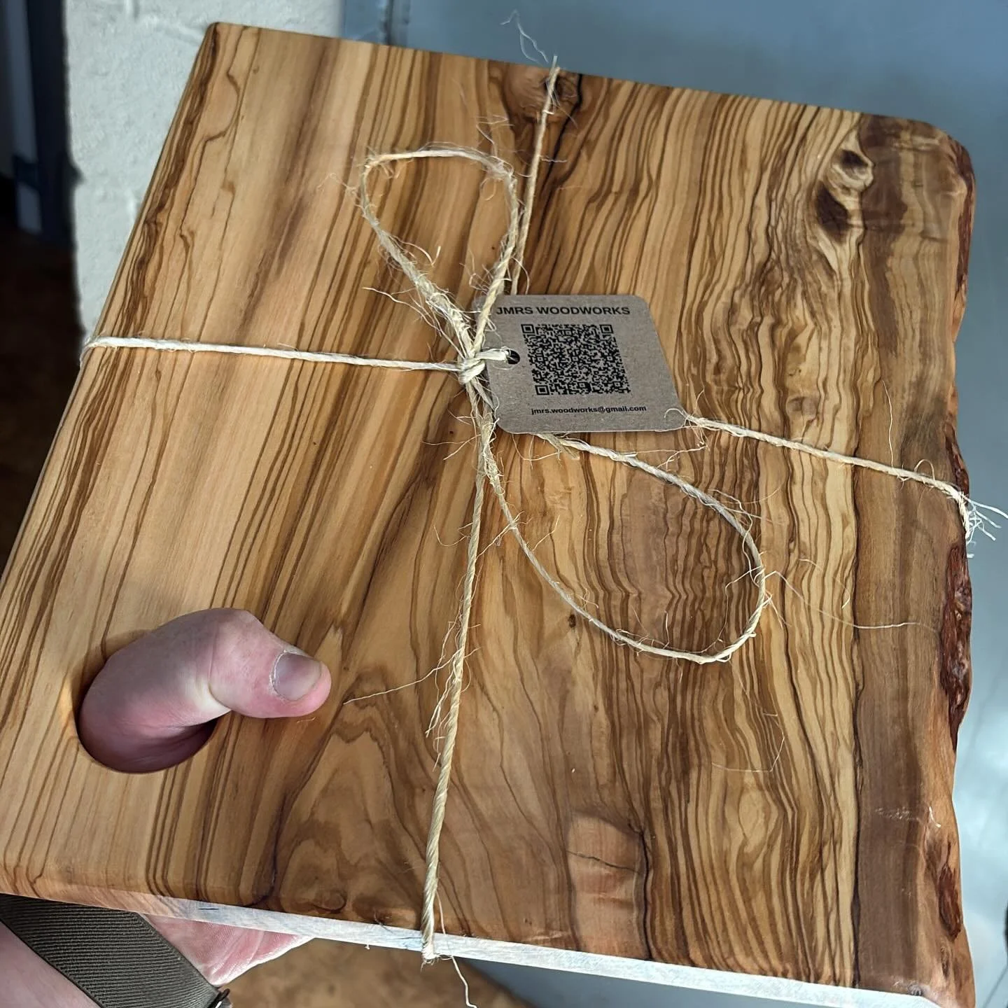 Olive wood might be my new favorite to work with. Cutting board with hand hold.