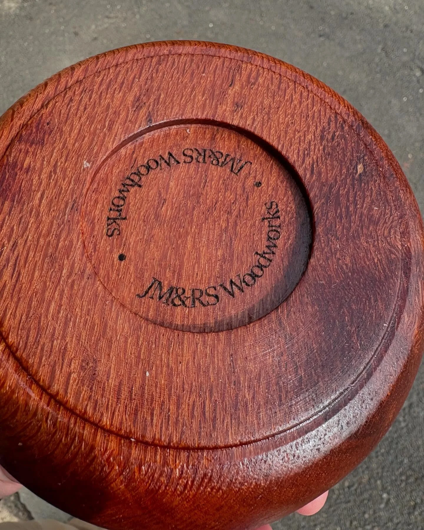 Leopard wood bowl logo on the bottom.