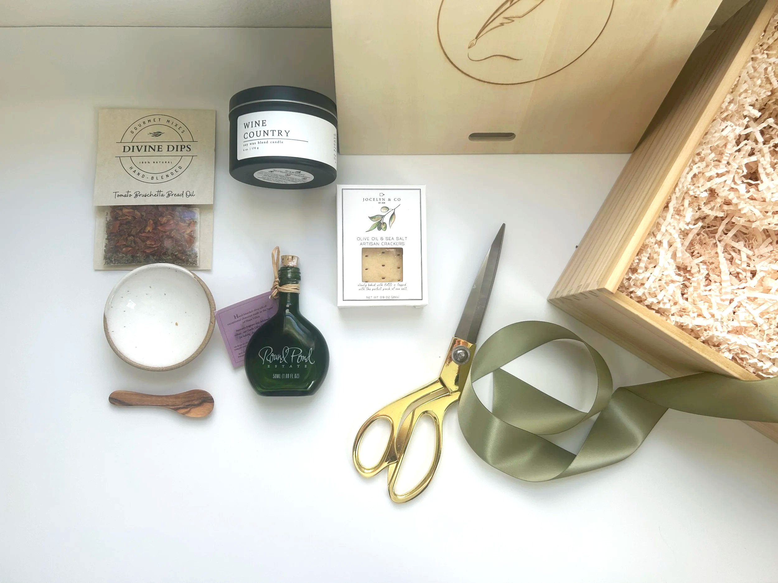 Several white boxes lined up with beautiful pink bows tied around them